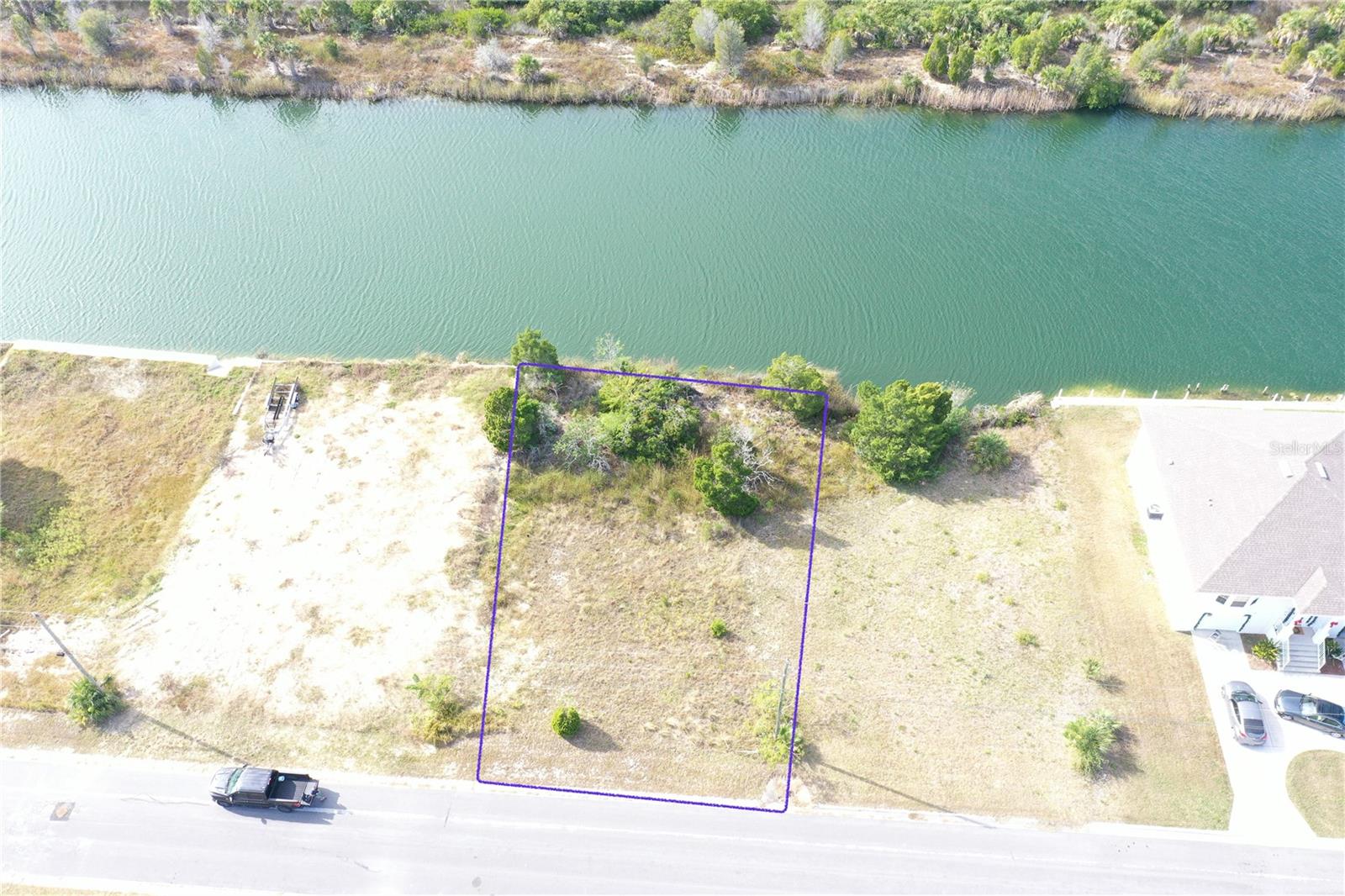 This vacant waterfront property provides a blank canvas to design your future home, with the potential for open-concept living spaces oriented toward the water. Buyers can envision a custom residence featuring expansive windows, outdoor entertaining areas, and seamless indoor-outdoor Florida living tailored to a coastal lifestyle, with NO HOA fees.

The property’s generous lot size allows for flexible design options, including space for a private dock, outdoor kitchen, patio, or pool area overlooking the canal. With direct canal frontage and indirect access to the Gulf of Mexico, this location is well-suited for boating, fishing, kayaking, and paddleboarding right from your backyard.

Located in Hernando Beach, the property is close to waterfront dining, local marinas, and everyday conveniences. Outdoor recreation is nearby at Weeki Wachee Springs State Park and Buccaneer Bay, while Tampa and Orlando are within driving distance for shopping, entertainment, and travel connections.

A rare opportunity to own a Gulf-access waterfront lot in Hernando Beach, this property combines location, water views, and lifestyle potential, making it an excellent choice for a future primary residence, vacation home, or investment property.
