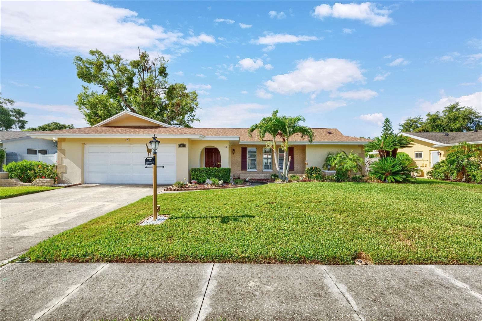 Virtually Staged. Opportunity knocks in one of Dunedin's most desirable golf cart friendly neighborhoods!  This 4 bedroom, 2 bathroom home has some amazing potential!!  The bright living room greets you with warm natural light, separate family room and dining area. Kitchen over looks the pool and yard! Added Bonus/FL room.  The split floor plan gives the primary suite its own privacy complete with generous closet & walk in shower. 3 spacious bedrooms on the opposite side ensure comfort and privacy for family or guests. If you've been looking for a home with incredible potential at an attractive entry price, this is it. While the home could benefit from some cosmetic updates, it offers outstanding bones, a functional floor plan, and a spacious backyard complete with a sparkling pool, large deck and covered area to entertain.  This home provides the perfect canvas to make it your own.  Major improvements have already been taken care of, including a new roof (2020), 6 yr HVAC system and an irrigation system supplied by reclaimed water to help keep landscaping costs down. Built with quality construction that's stood the test of time, these homes are known for their solid craftsmanship and durability.  Bring your vision and unlock the potential to create your dream home while building equity in a sought-after location close to everything Dunedin has to offer. This location....simply unbeatable! Less than a block from Hammock Park’s acres of shaded walking trails, and minutes from downtown Dunedin’s vibrant restaurants, breweries, shops, festivals, and waterfront sunsets. Enjoy easy access to Caladesi Island and Honeymoon Island, the Dunedin Golf Club, Pinellas Trail and the Dunedin Blue Jays Stadium. This is more than a home, it’s a lifestyle and every day feels a little like vacation!