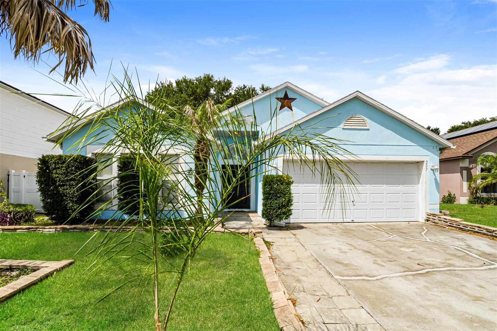 Charm and curb appeal abound for this Haines City home! Step inside the inviting foyer and into the living room, which is positioned at the center of the home. As you move through the home you'll find the dining room and the kitchen, which boasts stainless steel appliances, hard surface countertops, and ample storage. This ranch style floorplan is rounded out by the primary suite and two secondary bedrooms. Come and see for yourself the possibilities that this home has to offer!