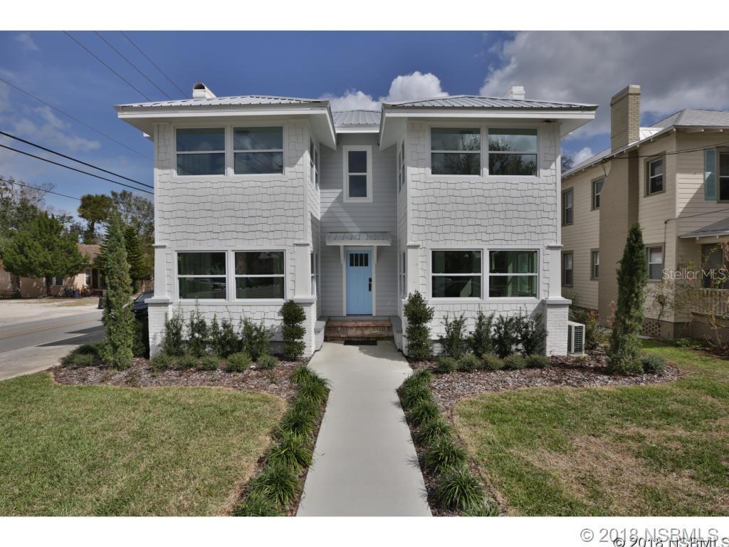 Unique Designer Rental is AVAILABLE.....A Rebuild using modern touches from Professionals when creating this beautiful layout.  Inside and Outside include unique one of a kind features.  Also add the key location of New Smyrna Beach's downtown famous Canal Street.  Available and ready to go very soon, make the contact now for a showing as they never last long.  PETS now allowed!!!
