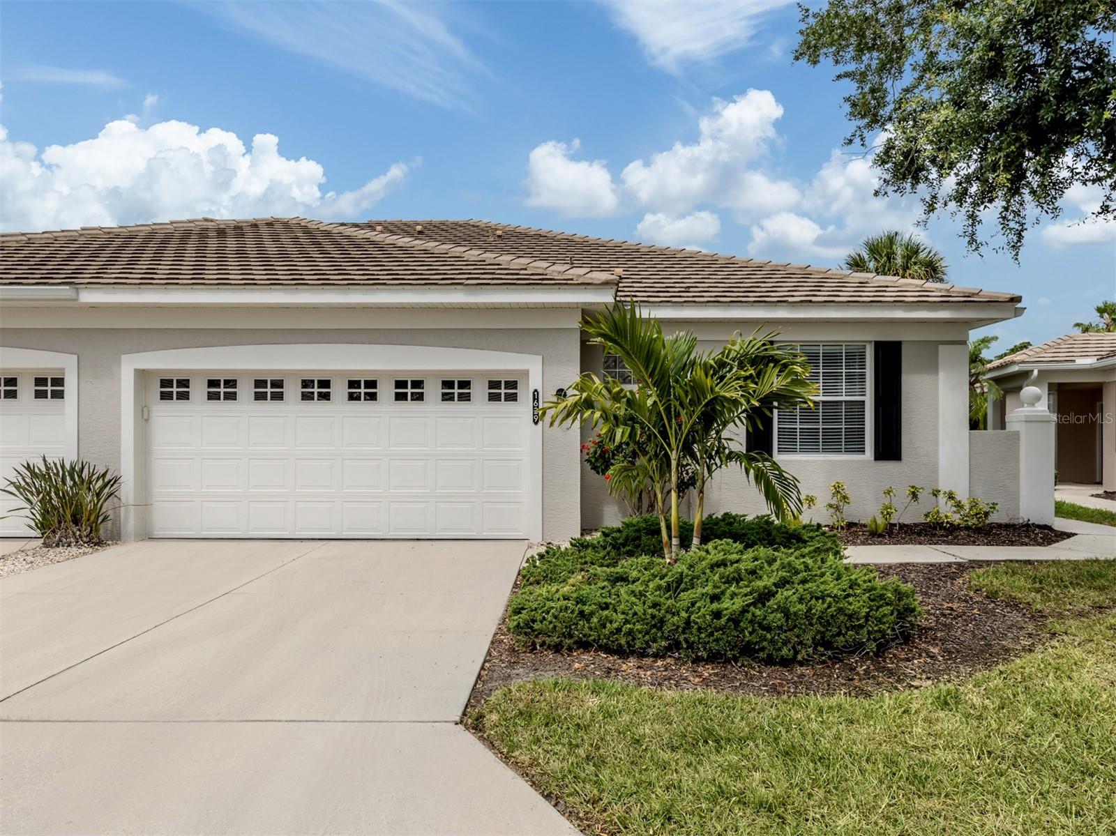 Beautifully maintained and offered furnished, this three-bedroom, two-bath paired villa combines comfort, convenience and easy Florida living. The thoughtfully designed floor plan includes a spacious two-car garage, an interior laundry room, and both front and rear screened porches, ideal for enjoying the outdoors year-round. NEW HVAC system was installed in 2024.  The HOA provides true maintenance-free living, allowing residents to enjoy a carefree lifestyle in a beautifully maintained community. Optional membership is available at Plantation Golf & Country Club, a privately owned club offering an exceptional resort-style experience. Members enjoy two championship 18-hole golf courses designed by Ron Garl, multiple dining venues, elegant banquet facilities, 12 Har-Tru tennis courts, a fully equipped fitness center and a Junior Olympic-size swimming pool. Ideally located near Wellen Park, residents have convenient access to premier shopping, dining, entertainment and the Atlanta Braves spring training facility. The charming Venice Island and pristine Gulf beaches are just 15 minutes away, while Interstate 75 is only 10 minutes from the community, providing easy access to Sarasota, Fort Myers, Tampa and major airports. Surrounded by cultural attractions, theaters and miles of breathtaking coastline, this location captures the best of the renowned Venice lifestyle.