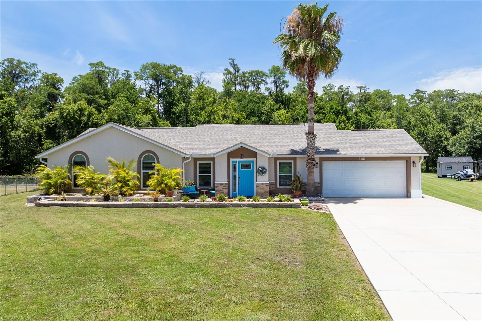 Welcome to this beautifully updated pool home offering the perfect blend of comfort, functionality, peace of mind, and NO HOA! Major improvements have already been completed, including a newer roof, gutters, impact windows and doors, A/C system, electrical panel, and water heater. Inside, you'll find a thoughtfully remodeled kitchen, beautifully updated primary bathroom, renovated guest and pool bathrooms, fresh interior paint, and newer Whirlpool oven and microwave.  Step outside and enjoy the Florida lifestyle with a spacious pool area, professionally maintained landscaping complete with irrigation and landscape lighting, a widened and reinforced concrete driveway, a 20x20 carport, and a 12x14 garden shed for additional storage. The freshly painted exterior adds to the home's curb appeal and move-in-ready condition.  Conveniently located in Kissimmee with easy access to shopping, dining, entertainment, major roadways, and area attractions, this meticulously maintained home offers exceptional value and is ready for its next owner. Schedule your private showing today!