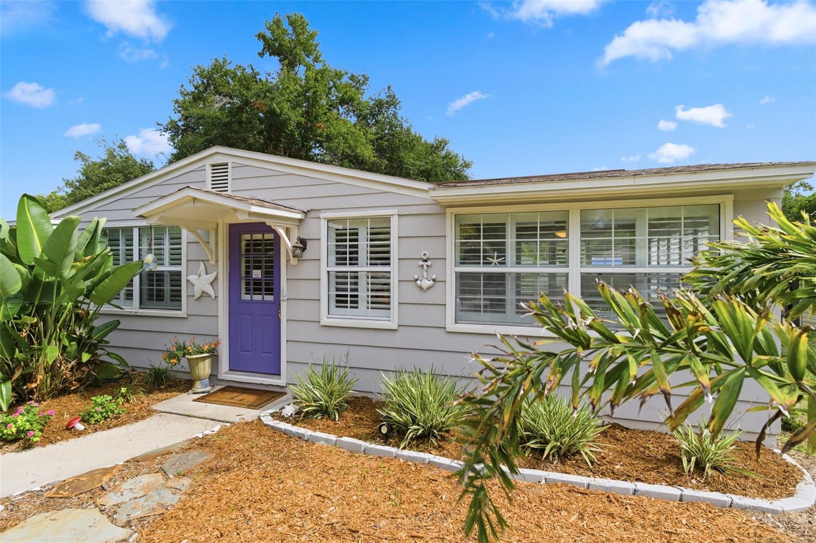 Location. Lifestyle. Charm. This one checks every box.
Welcome to your own slice of Dunedin paradise, where small town charm meets coastal living and every day feels a little like a vacation. Perfectly positioned just moments from the heart of Downtown Dunedin and located within the highly sought after golf cart zone, this home puts you at the center of everything that makes Dunedin one of Florida's most beloved waterfront communities.
Imagine starting your morning with a coffee from your favorite local café, spending the afternoon browsing unique shops, enjoying lunch at a waterfront restaurant, or stopping by one of the area's popular breweries. Whether you prefer to walk, bike, or hop in your golf cart, Main Street and all its charm are just minutes away.
Inside, you'll find a home that blends comfort and convenience with thoughtful updates, including a beautifully modernized bathroom and energy efficient double pane windows that help keep the home comfortable year round. The inviting screened patio is the perfect place to unwind after a day of exploring, offering a peaceful retreat for morning coffee, evening cocktails, or simply enjoying Florida's beautiful weather without the bugs joining the party.
Step outside and discover one of this property's biggest surprises... a huge backyard with endless possibilities. Whether you dream of adding a pool, creating an outdoor entertainment space, starting a garden, or simply enjoying room to roam, you'll appreciate the space and flexibility this yard provides.

For outdoor enthusiasts, the renowned Pinellas Trail is only a quick five minute bike ride away, offering miles of scenic pathways for cycling, walking, and jogging. When beach days call, you'll love being close to both world famous Clearwater Beach and the natural beauty of Honeymoon Island.
And of course, no Dunedin lifestyle is complete without those legendary Gulf Coast sunsets. Take a short trip to nearby Edgewater Drive and watch the sky transform into a masterpiece of color as the sun dips below the horizon. It's the kind of view that reminds you why people dream of living here.
Homes in this location don't come along often, and when they do, they don't stay available for long. Schedule your private showing today and discover why this could be the home you've been waiting for. Your golf cart may be just as excited as you are