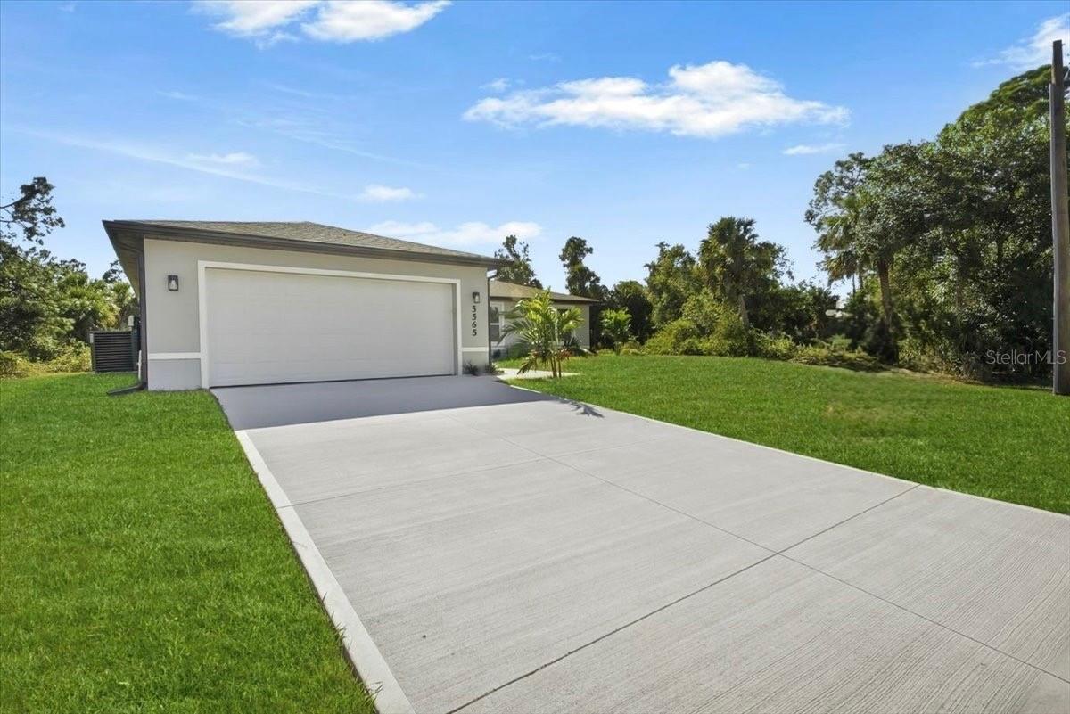 One or more photo(s) has been virtually staged. Welcome to your brand new 3 bedroom, 2 bathroom home located in the fast growing city of North Port. Offering 1,600 square feet under air and over 2,000 square feet total, this property is thoughtfully designed for comfort, functionality, and modern living.

Step inside to an open, light-filled floor plan that creates an inviting atmosphere for everyday living and effortless entertaining. The modern kitchen features sleek cabinetry, quality finishes, and ample counter space, perfect for cooking, hosting, or gathering with family and friends.

The spacious primary suite features a generous walk-in closet and a beautifully finished bathroom, creating a true retreat feel. Two additional bedrooms give flexibility for guests, family, or a home office. A two-car garage provides convenient storage and parking.

Location is one of this home’s strongest advantages. You will be just minutes from shopping, dining, parks, and top rated schools, with CoolToday Park right around the corner. Enjoy quick access to I 75 and US 41, making commutes to Sarasota, Fort Myers, or Tampa simple. And when it is time to unwind, the Gulf Coast beaches of Venice and Sarasota are only a short drive away.

This is more than new construction. It is an opportunity to enjoy the best of Florida living in a prime and rapidly appreciating area.