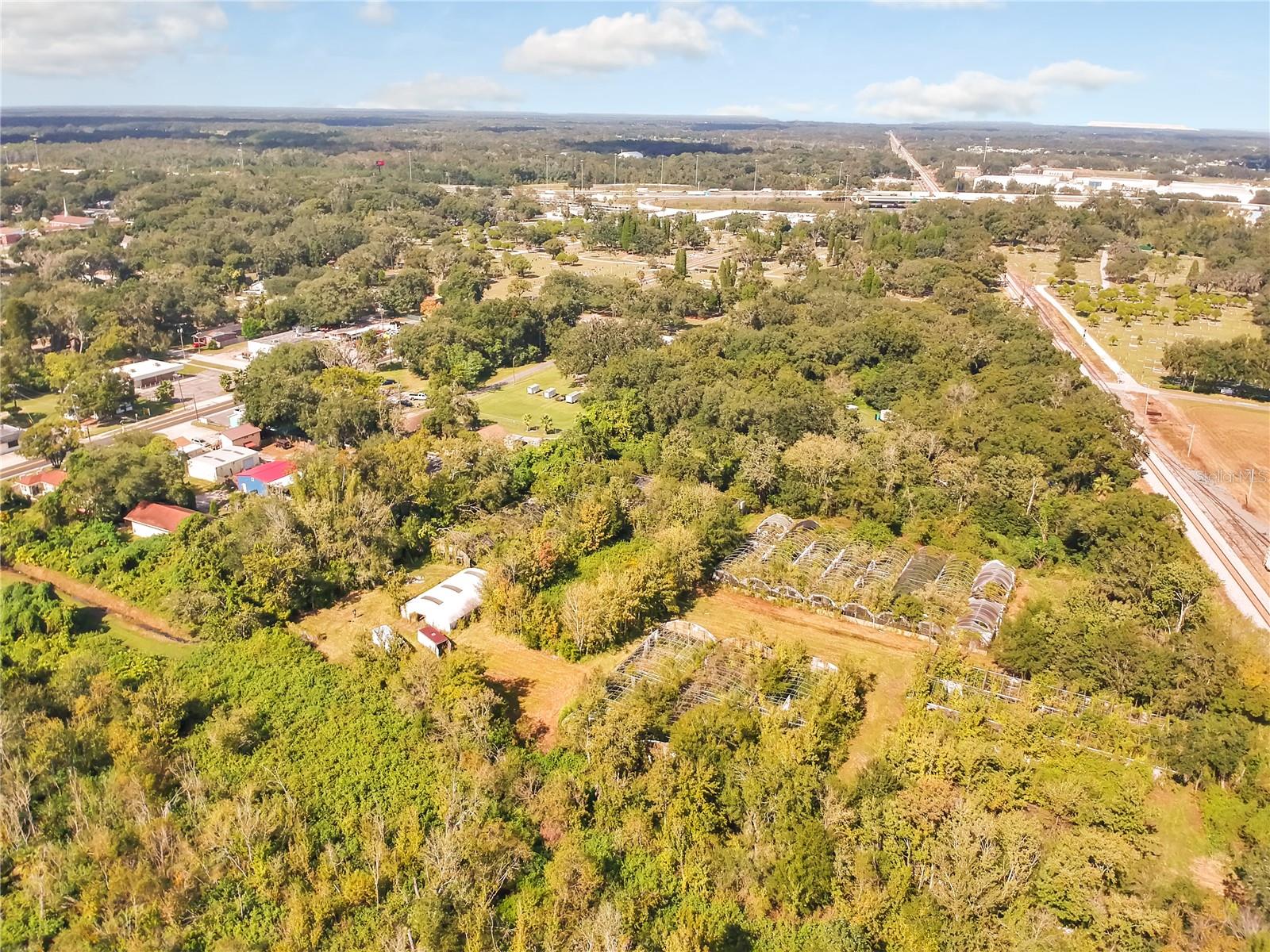TRASKS ADD TO PLANT CITY - Land