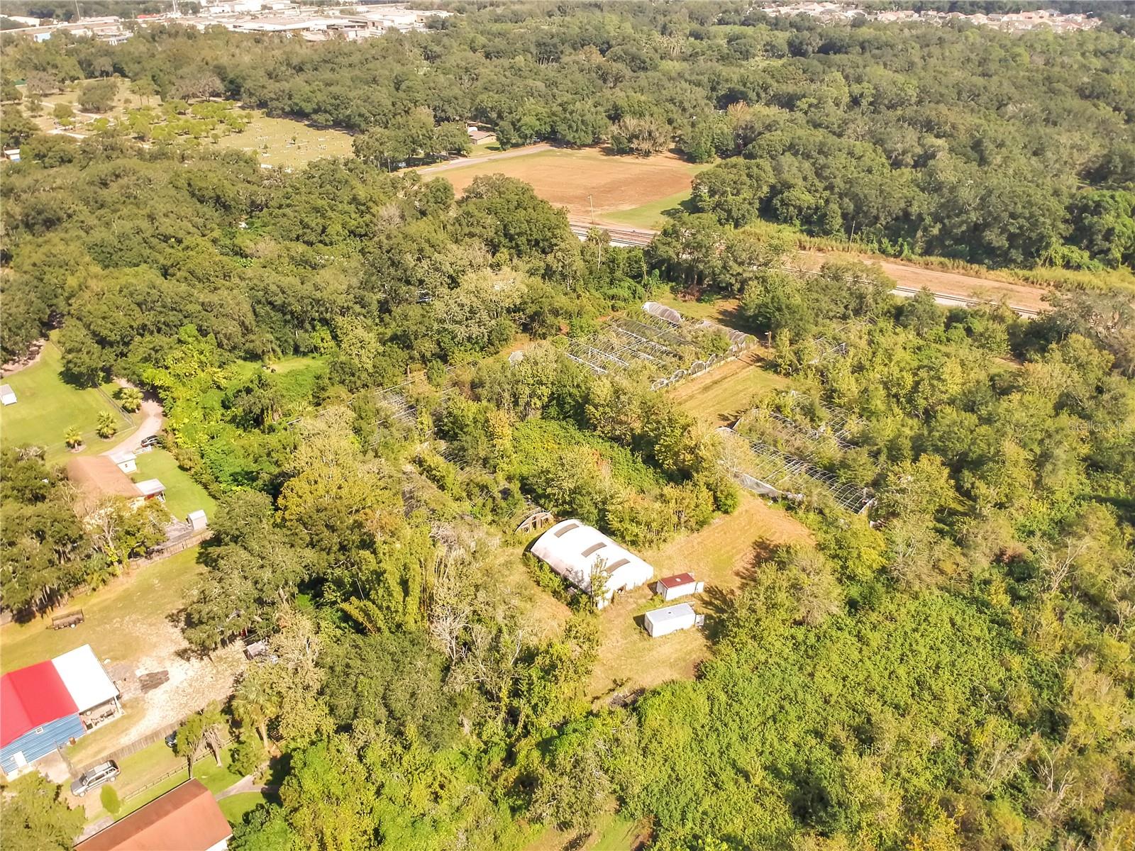 TRASKS ADD TO PLANT CITY - Land