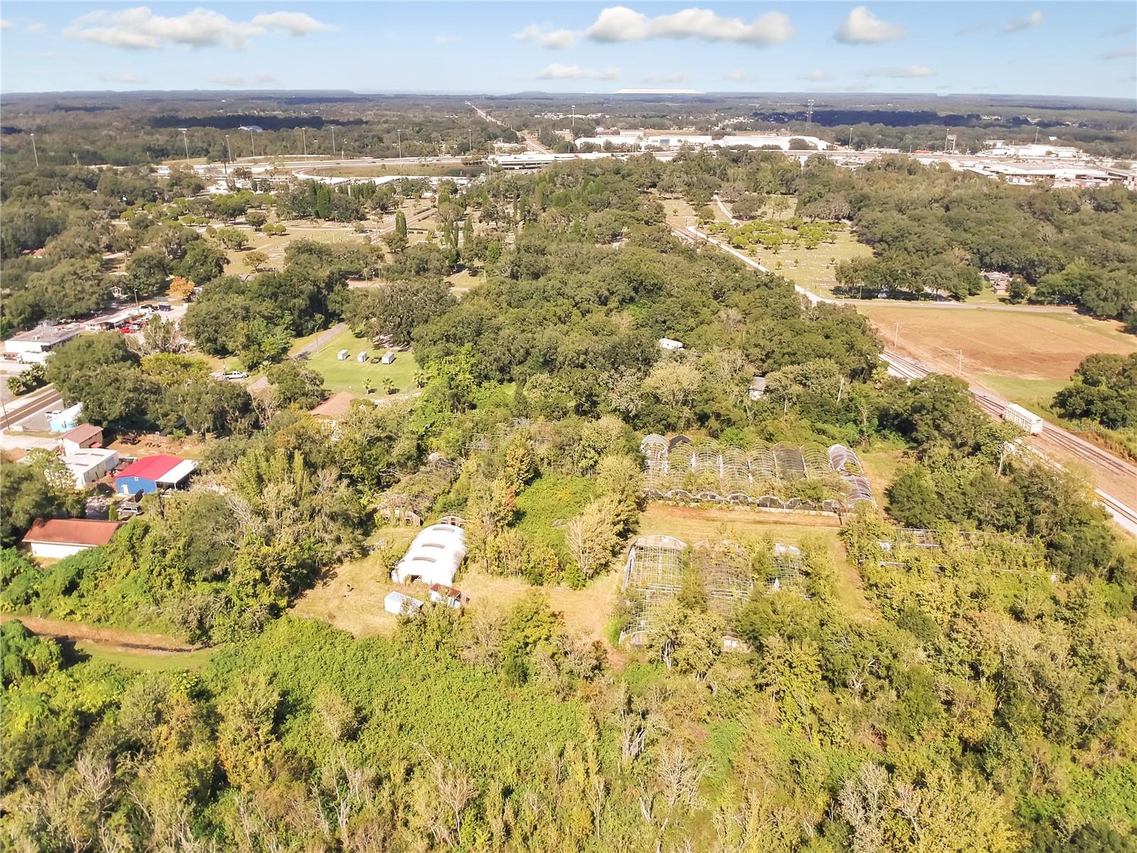 TRASKS ADD TO PLANT CITY - Land