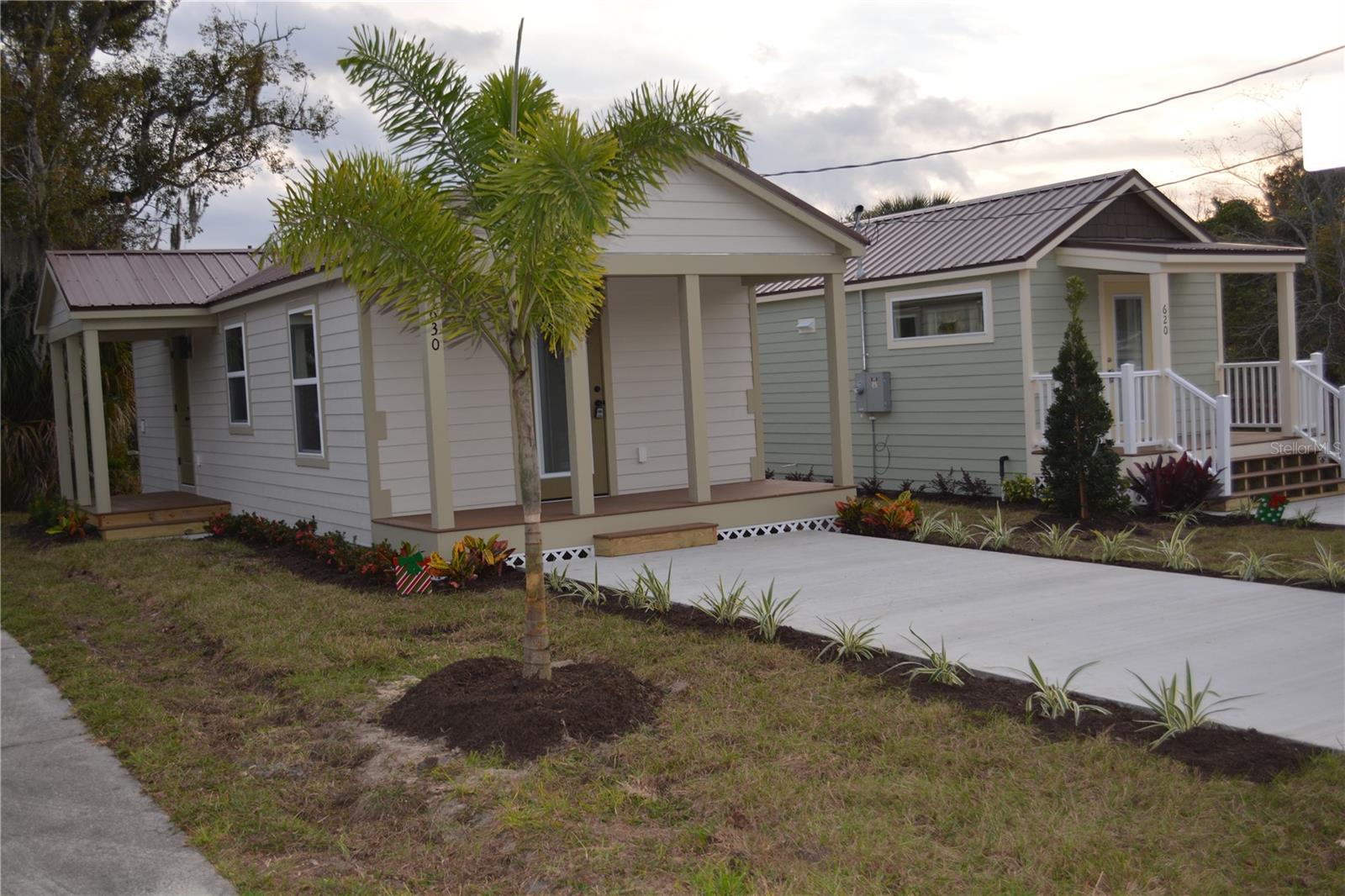 Janie Model  * 2 Bedrooms and 1 Bath  * 504 square feet with inside utility * currently there are 10 tiny house occupied in this location * only three homes remaining * can use the property as a first time homebuyer OR just downsizing * use as a short or long term rental or Airbnb * close to grocery stores in two directions * close to all schools and UCF College * Orlando International Airport about 30 minutes and same for all the parks * nice restaurants and close to all the beaches . NO HOA FEES TO * Janie was our first 14' wide unit. It features all the amenities of all our models, with a wider footprint making the home much more spacious. These wider homes are more accommodating to king-size beds and larger furniture options. The Janie model also conforms to lots with a minimum square foot requirement of over 504 square feet. All appliances are included ALONG  the Stackable Washer and Dryer also.