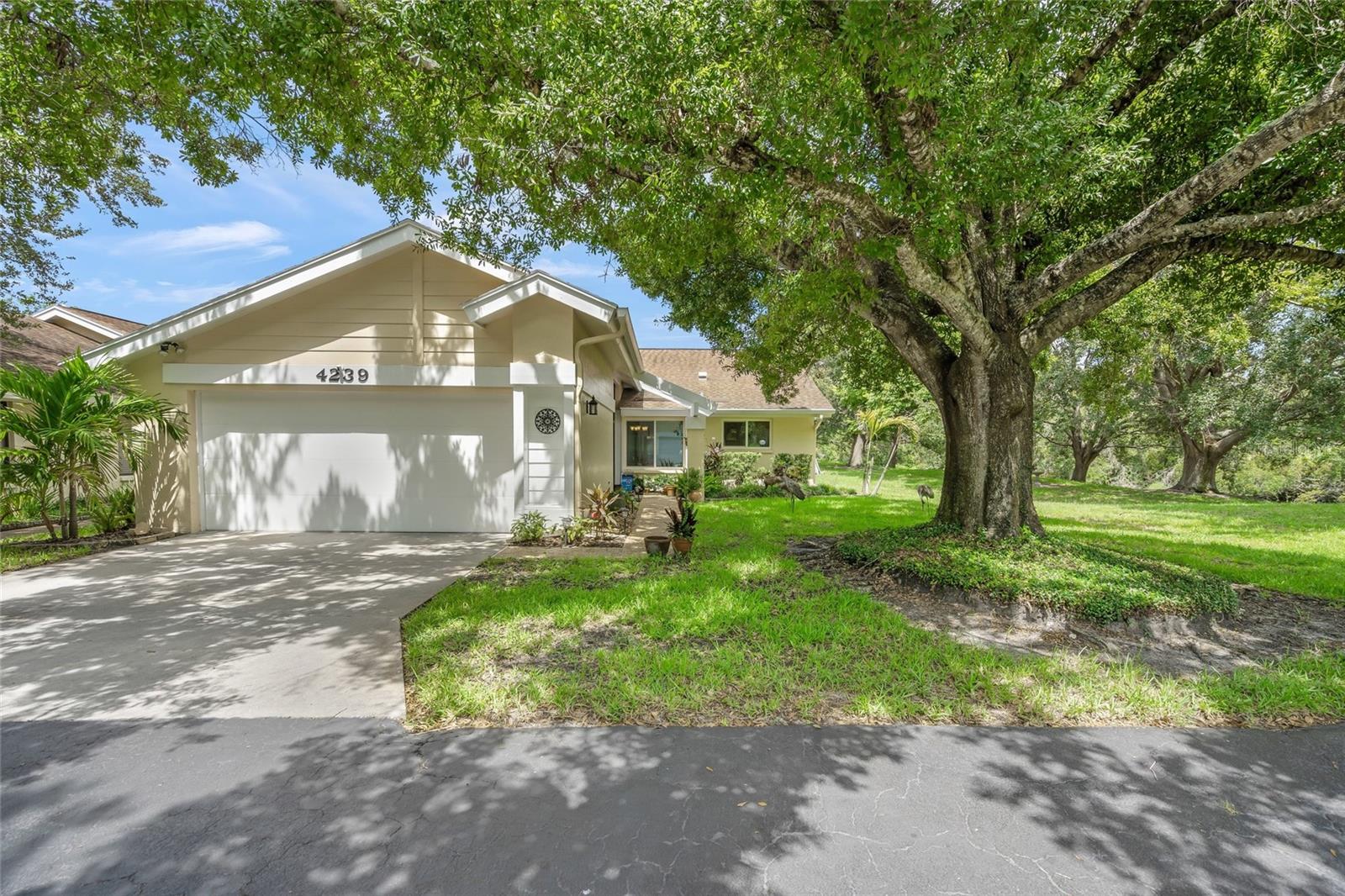 "Buy the Location, We'll Include the Villa!"

Tucked away on a private cul-de-sac in the sought-after Knolls of Bent Tree, this beautifully updated and impeccably maintained 2-bedroom, 2-bath villa offers the best of peaceful Florida living. Enjoy serene views of an expansive greenbelt and gentle stream from your enclosed, air-conditioned lanai—your own private sanctuary frequented by cranes, deer, and other friendly wildlife.

Inside, you’ll find a formal living and dining room, an updated eat-in kitchen, and two spacious bedrooms, including a primary suite with ensuite bath and skylight. The villa also features an attached 2-car garage and sits within a quiet, well-kept community of just 52 freestanding villas and townhomes.

This is one property you truly must see to appreciate. Superb setting, thoughtful updates, and move-in ready comfort—all in one rare find. Home has PGT Impact Windows, house water lines repipe (2019), ceiling insulation upgraded to R36, new A/C (2025), new water heater (2025), exterior painted (2025), roof (2013) And MORE GREAT NEWS, the association has just reduced the quarterly fee by $150.00