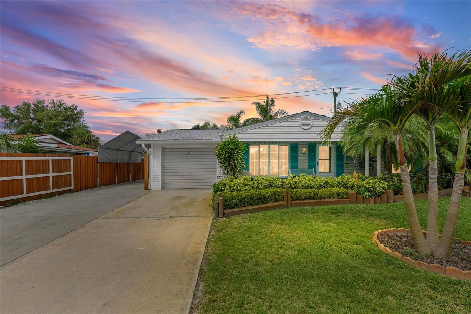 Welcome to 2545 Ednor Street in Port Charlotte, a charming retreat tucked away on a quiet, low-traffic street where peace and privacy are part of everyday living. This inviting home is designed for both relaxation and entertaining, offering an ideal blend of indoor comfort and outdoor enjoyment. Inside, you'll find a unique built-in bar area, creating the perfect space to host friends and family for gatherings, game nights, or special occasions. The home's layout flows seamlessly to the outdoor living area, where the real Florida lifestyle awaits. Step outside to enjoy the deck and covered seating area, an ideal spot for morning coffee, evening cocktails, or simply taking in the serene surroundings. Whether you're looking for a year-round residence, seasonal getaway, or a home built for entertaining, this property offers the perfect combination of tranquility, comfort, and Florida charm.