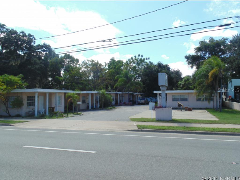 Great location for this 8 unit apartment complex!  6 1 bedroom apts, 1 2 bedroom apt and 1 efficiency are always full.  Concrete block construction with 2 carports and ample parking.  All apartments are tiled and have window a/c and heat units.  Refrigerator, range and microwave in each unit as well.  There is one common washer and dryer on the premises for tenant use.