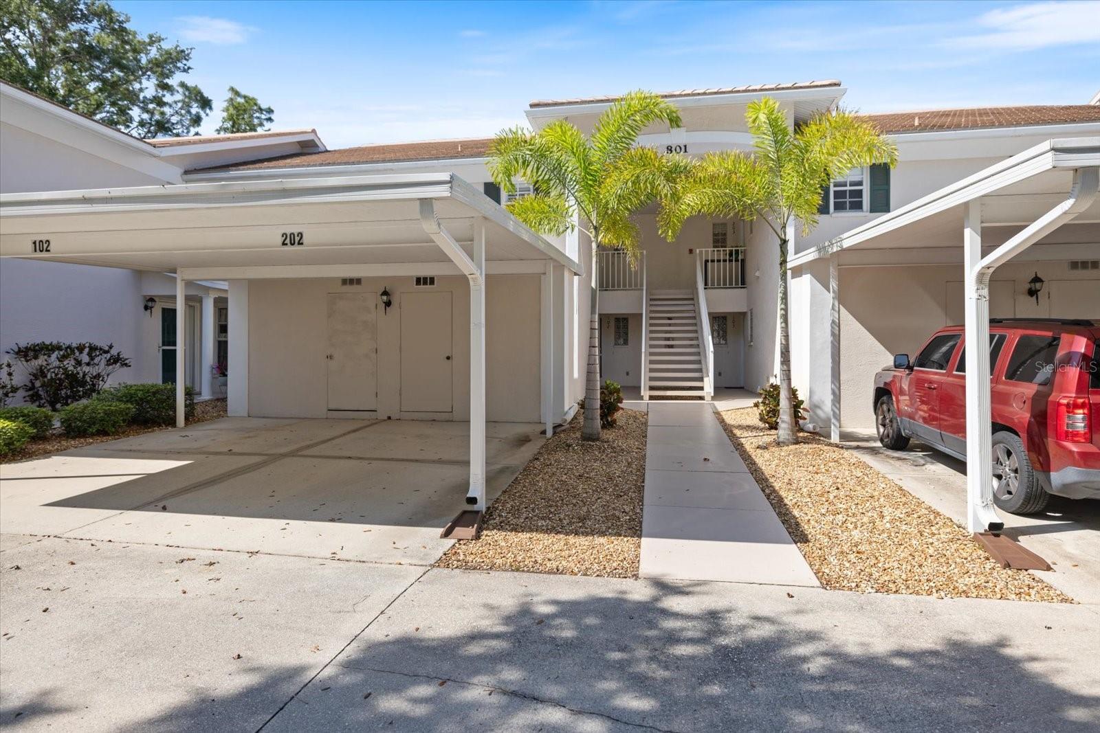 If you’ve been looking for a clean, move-in ready condo with a great golf course view, this TURNKEY FURNISHED unit is worth a look. Welcome to 801 Montrose Dr. #202, located in the Gardens of St. Andrews Park. This beautifully maintained SECOND FLOOR 2 bedroom, 2 bathroom condo offers peaceful views overlooking the 16th hole of the Bobcat Course at Plantation Golf & Country Club. As you step inside, you’re welcomed by a light-filled living space with a layout that flows comfortably from the kitchen into the dining and living areas. Vaulted ceilings enhance the sense of openness, creating an easy, inviting feel for both everyday living and entertaining. Just off the main living area, the lanai provides a relaxing setting to take in the golf course and tropical surroundings—an ideal spot for morning coffee or winding down at the end of the day. The split bedroom floor plan offers privacy for both owners and guests. The primary suite is positioned toward the back of the condo and features a walk-in closet and en-suite bath. The guest bedroom and bathroom are located toward the front, providing a comfortable setup for visitors or extended stays. Offered TURNKEY FURNISHED, this condo has been well cared for and is ready for immediate use. Additional features include in-unit laundry, ample storage, and covered parking with a private storage closet. Residents of the Gardens of St. Andrews Park enjoy a maintenance-free lifestyle with access to a heated community pool and clubhouse. Club membership is optional, with golf, tennis, and social options available for those who choose to participate. Ideally located just minutes from Venice Island, Gulf beaches, dining, shopping, and Wellen Park, this property presents a great opportunity for seasonal or year-round living in one of the area’s most established communities.