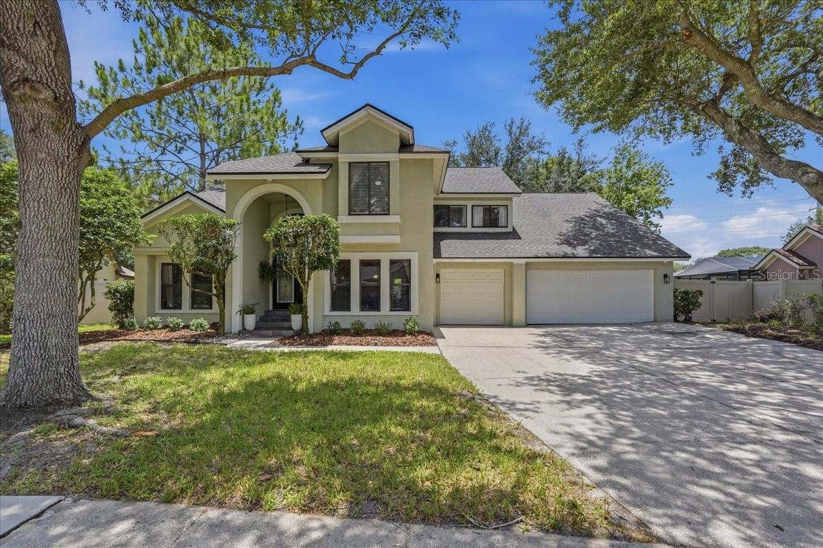 Welcome to the highly sought-after Wyndham community in Tampa Palms, where this exceptional 4-bedroom, 3-bath home with a versatile bonus room, 3-car garage, and outdoor kitchen is ready to impress! Situated on an oversized ¼-acre lot, this home offers the perfect blend of space, comfort, and modern updates. Enjoy peace of mind knowing the roof, HVAC system, refrigerator, and dishwasher were all replaced in 2022, while the stove is brand new. The guest bathroom was beautifully remodeled in 2023, and the pool bath received a stylish renovation in 2025. From the moment you step inside, you’ll appreciate that this is anything but a cookie-cutter home. The spectacular 15’ x 30’ family/living room features soaring vaulted ceilings, newly installed carpet, and an abundance of natural light streaming through windows at both the front and back of the home, creating an inviting space perfect for everyday living, entertaining, and holiday gatherings. The spacious first-floor primary suite is a true retreat, complete with a huge walk-in closet and a private en-suite bath featuring dual vanities, a separate shower, and a relaxing Jacuzzi tub. Just beyond the primary suite is a versatile bonus room - ideal as a home office, nursery, fitness room, reading lounge, or private sitting area. The well-appointed kitchen offers abundant cabinetry, granite countertops, stainless steel appliances, a wine cooler, and plenty of space for preparing meals and entertaining. Upstairs, you’ll find three additional bedrooms, two of which feature walk-in closets. Step outside to your fully screened lanai, where an outdoor kitchen with a built-in propane grill creates the perfect setting for year-round Florida entertaining. The fully fenced backyard features low-maintenance vinyl privacy fencing (2023) and offers plenty of room for pets, play, and outdoor enjoyment. Best of all, the oversized yard can easily accommodate your dream pool while still leaving ample green space for family activities and entertaining. Residents of this community enjoy Hampton Park, which features a community pool, tennis, pickleball, and basketball courts, and a kids' playground! This is a rare opportunity to own a beautifully updated home in one of Tampa Palms’ most desirable neighborhoods - close to top-rated schools, shopping, dining, parks, hospitals, Wiregrass Mall, Tampa Premium Outlets, golf, and major highways.