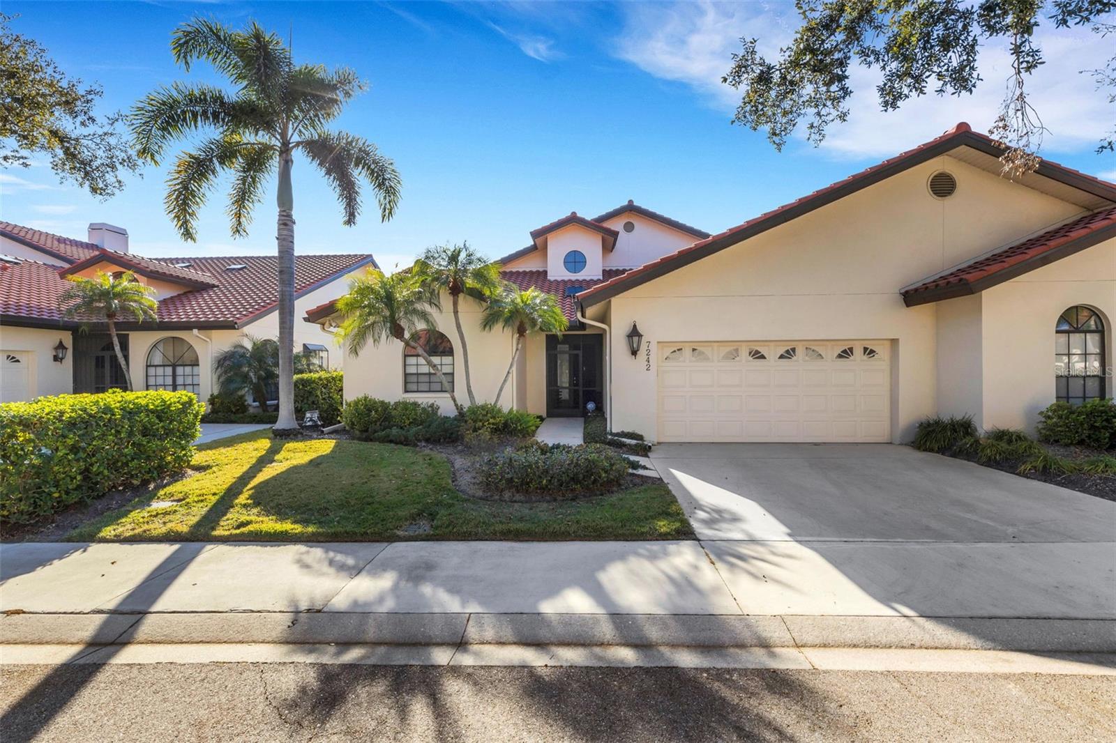 Come see this gorgeous home in Villa D’Este of the prestigious Prestancia community. This beautifully updated home offers a bright, open floor plan with soaring ceilings and effortless indoor-outdoor living. The inviting great room features a natural fireplace and wet bar, flowing into the dining area—perfect for entertaining or relaxing in style. This spacious three-bedroom, three-bath residence touts generously sized rooms and two primary suites, each with new custom-finished walk-in closets and recently renovated en-suite baths. The first floor offers two bedrooms for easy everyday living with the staircase leading to a cozy loft area and a private second primary suite upstairs. The kitchen showcases newer stainless steel appliances opening to a light-filled family room that enhances the home’s open, airy décor. Sliding glass doors create seamless indoor-outdoor living, leading to the lanai and a new semi-private patio with updated landscaping. Recent upgrades include a new roof and skylights, fresh interior paint, new ceiling fans throughout, custom motorized blinds, two newer HVAC systems, and R-40 insulation in the attic for enhanced energy efficiency. The primary bathroom is elevated with luxury towel warmers, while practical updates include a brand-new washer and dryer and a freshly painted two-car garage with epoxy-coated floors. Enjoy the elegance and security of this prestigious gated community, with optional membership available at TPC Prestancia Golf Club, offering two championship 18-hole courses. This exceptional home combines comfort, luxury, and lifestyle—schedule your private showing today.
