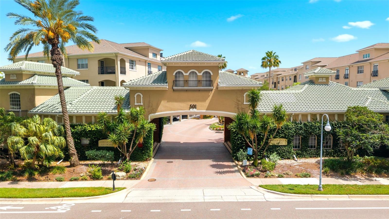 Experience the rare opportunity to own in one of Tampa’s most exclusive neighborhoods-Harbour Island. Located in the gated community of Harbour Place City Homes, this beautifully maintained residence offers the perfect balance of privacy, sophistication, and walkable city living. Placed on the third floor with no one above you, this 2 bedroom + 2 bathroom condo offers a bright, warm and refined atmosphere- enhanced by natural light and views of sunrises and sunsets. The airy primary suite serves as a private retreat with a custom walk-in closet- featuring a built in for organization, a Juliet balcony, and an en-suite bath. The secondary bedroom offers flexibility for guests, and/ or home office with a Murphy bed and an integrated desk. Enjoy resort-style amenities including a pool oasis with a shaded area containing TVs and chairs + tables, fitness center, business center, grilling areas, gated security, and assigned covered parking.  Every detail is designed to support both full-time living and a low-maintenance lifestyle unmatched in a location that places you just steps from the Tampa Riverwalk, Water Street, Downtown Tampa, Amalie Arena, fine dining, coffee shops, and so much more. Whether commuting, entertaining, or enjoying waterfront strolls, everything is within effortless reach. Schedule your showing today!