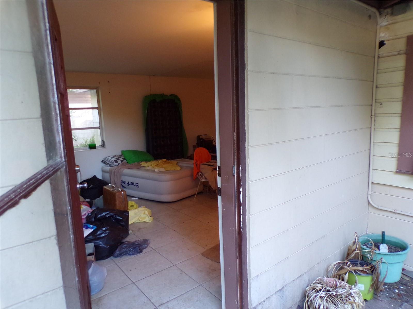 Unbeatable location and a rare opportunity for the right buyers. Come see this priced to sell quick 3 bedroom home on a double lot(almost one third of an acre) with separate 624 sq. ft. two car garage/workshop. Deluxe handyman Estate Sale special. Located minutes to everything, parks, Gulf access for boating, beaches and recreation, Tarpon Sponge docks, shopping, medical and more.