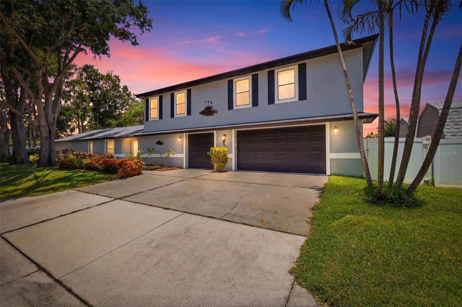 Wake up to lake life every day from this end-of-canal home on a large lot with direct access to Lake Tarpon. A private dock with boatlift puts the water at your back door, and evenings here mean front-row seats to the sunset over the lake. Inside, 3,172 square feet of living space spans four bedrooms and three and a half baths, offering room to spread out and entertain. The oversized garage adds 1,300 square feet of additional space — ideal for storage, a workshop, or extra vehicles — and is complemented by two RV hookups on the property, a rare find for boaters, fishermen, and travelers alike. Recent updates give this home real staying power: a new AC system installed in 2022, a soft water system for whole home and a reverse osmosis water system for kitchen, and a 220V generator hookup for peace of mind during Florida's storm season. Set on a large end-of-canal lot, the property offers privacy and space that's increasingly hard to find on the water. Location is unbeatable for boating and golf enthusiasts alike, with easy proximity to Innisbrook Country Club. Waterfront homes with this combination of lot size, canal position, and lake access don't come along often. Schedule your private showing today.