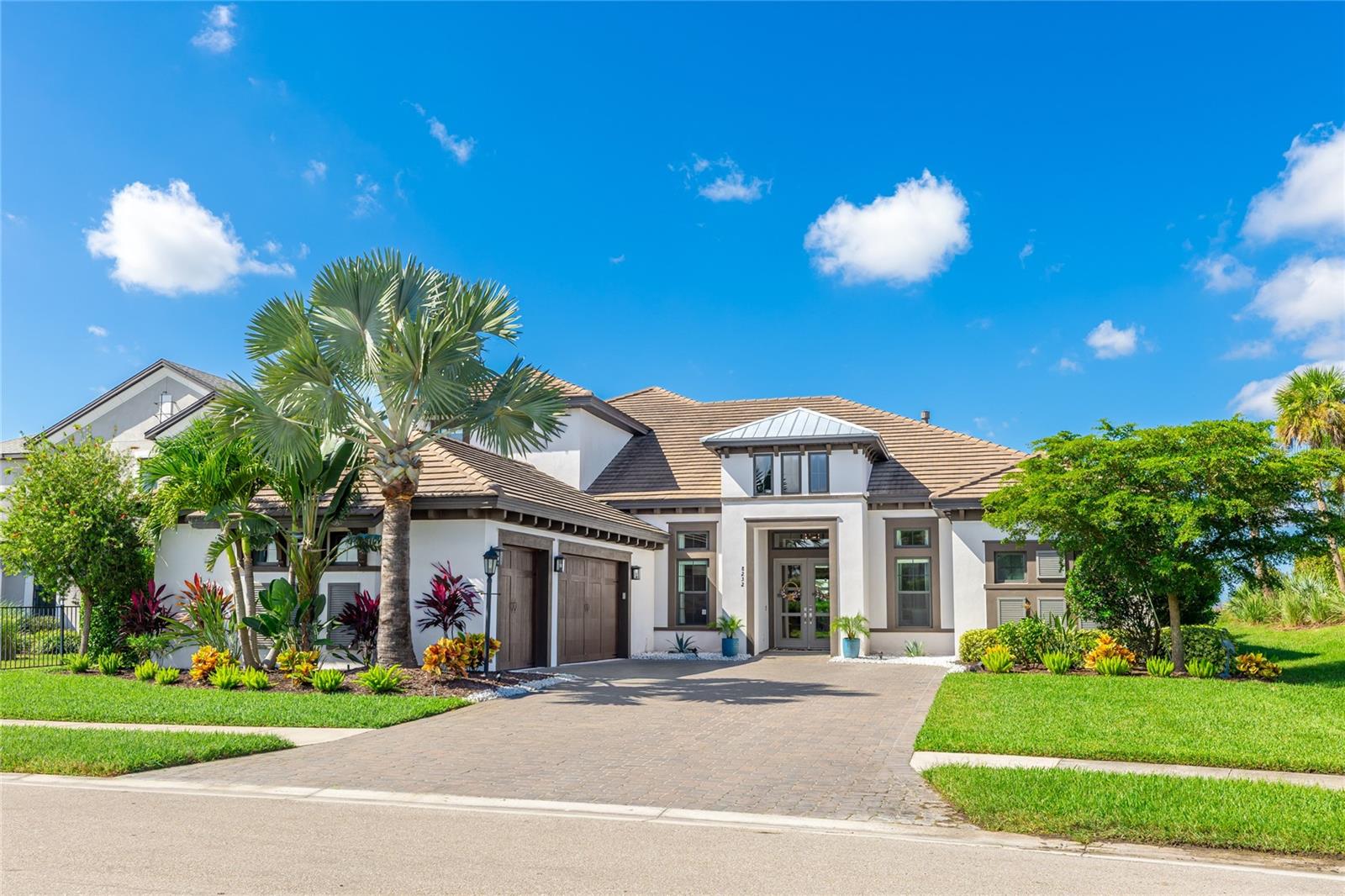 A showcase of craftsmanship, design, and lifestyle, this former builder model in Cassia at Skye Ranch represents one of the community’s most distinguished opportunities. Positioned on a private preserve homesite, this 4 bedroom, 4.5 bath residence offers 4,541 square feet of thoughtfully designed living space with soaring ceilings, crown molding, professionally designed custom wall treatments, and exceptional designer finishes throughout.

The great room is anchored by custom built-ins and a fireplace, while the chef’s kitchen features an oversized island, built-in ovens, illuminated cabinetry, premium appliances, and a spacious walk-in pantry. The main level includes a private study, formal dining area, two en suite guest bedrooms, and a luxurious owner’s retreat with lanai access, dual custom closets, and a spa inspired bath with an oversized dual entry shower.

Upstairs, a spacious game room with wet bar and full bath offers flexible space for guests, recreation, or multi generational living.

Pocketing sliders open to a resort style outdoor retreat featuring a covered lanai, summer kitchen, pool, spa, and tranquil preserve views. Premium upgrades include impact windows and doors, motorized shades, integrated smart home technology, whole home audio, three zone HVAC, whole home surge protection, an on demand tankless water heater, tile roof, paver driveway, designer lighting, custom closet systems, and an oversized three car garage.

Residents enjoy access to Skye Ranch’s resort style amenities, parks, trails, and recreational facilities, all just minutes from top rated schools, Waterside Place, downtown Sarasota, and world renowned Siesta Key Beach.

One of the finest homes offered within Cassia at Skye Ranch, this exceptional residence delivers a level of design, privacy, and lifestyle rarely found in today’s market.
