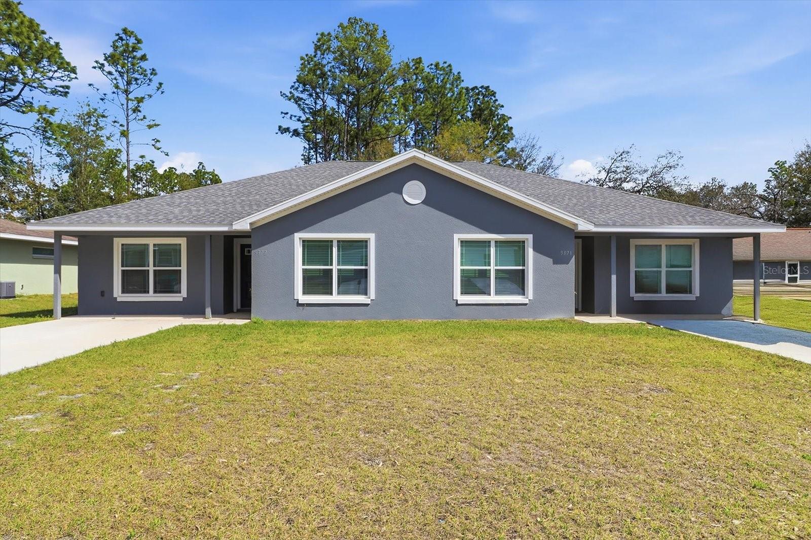 Newer construction duplex located in the desirable Citrus Springs community. This solid block construction property features two spacious 3-bedroom, 2-bathroom units, each offering an open-concept layout with cathedral ceilings that create a bright and airy feel throughout.
Both units include a private primary suite with walk-in shower, a guest bathroom with tub/shower combination, and sliding glass doors leading to a screened-in back porch, perfect for relaxing or entertaining. The well-designed floor plan offers comfort, functionality, and strong rental appeal.
The property is connected to county water, and each unit is equipped with its own separate septic system. No HOA restrictions.
Conveniently located near shopping, dining, medical facilities, schools, and the Withlacoochee State Trail, with easy access to Crystal River, Dunnellon, and Ocala.
Excellent opportunity for investors seeking rental income or owner-occupants looking to live in one unit and rent the other. One half is currently being rented out.