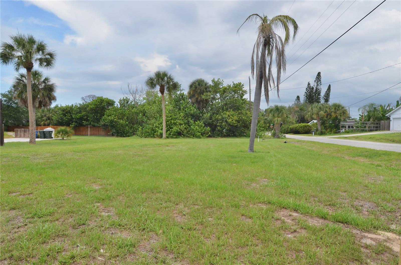 Build Your Florida Lifestyle! This vacant residential corner lot offers 11,052 square feet, or about 0.25 acres, in a well-located setting with strong everyday convenience and easy access to some of the area’s most loved destinations. With approximately 80 feet of road frontage along the South facing front side and about 138 feet of frontage along the East side, this homesite offers a flexible corner lot layout with added visibility and design potential. The location is a major highlight. The property is close to the recently improved Nokomis Community Park, where outdoor space, recreation, and community amenities are nearby. Legacy Trail is also within close reach, offering access to one of the area’s standout biking and walking routes. Gulf beaches, including Nokomis Beach and Venice Beach, are nearby for days by the water, sunset views, and coastal recreation. You are also close to Venice Island and Historic Downtown Venice, known for dining, shopping, local events, and a charming main street setting. Venice Theatre, golf courses, restaurants, shopping, area schools, Sarasota Memorial Hospital - Venice, and I-75 are all within convenient reach, helping make this location practical for everyday living and weekend plans alike. Vacant residential land in a location like this gives you the chance to create something that fits your needs from the beginning. Bring your builder, review your options, and explore the potential of this corner homesite in Nokomis. Don't miss the opportunity to create your own Florida Retreat!