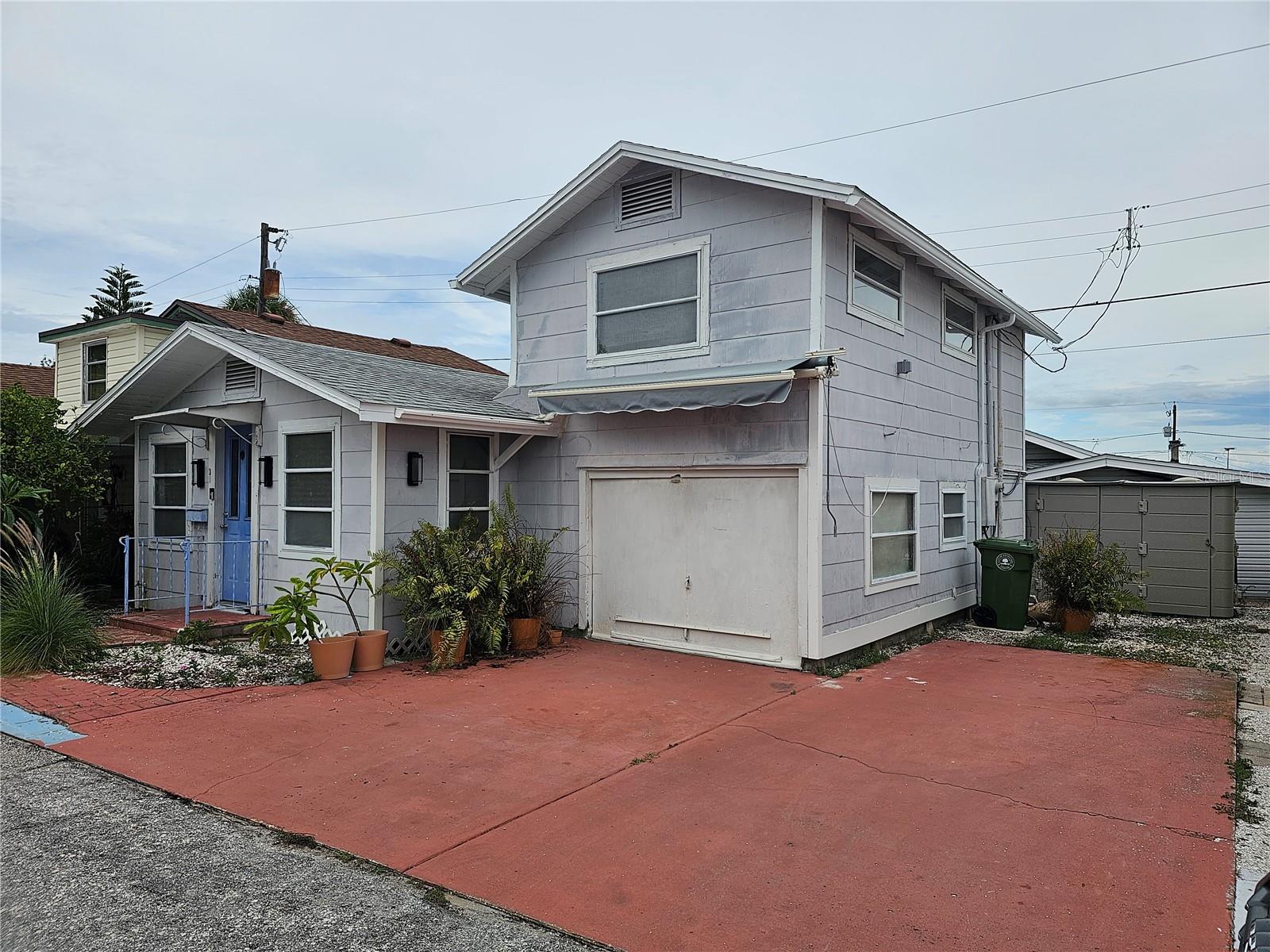 This fixer-upper cottage is located within the historic Braden Castle Park community.  The current owner has begun the needed renovations including repairs to the soffit's, removal of an old suspended ceiling to expose the original tongue-and-groove ceiling, new sheet rock walls (unfinished), and luxury plank vinyl flooring.  The roof was replaced in 2018.  Property is located on the highest elevation in Braden River Park and is NOT IN A FLOOD ZONE.  Many of the circa 1925 cottages have been totally renovated and live like little doll-houses in this unique, adult-only 55+ community with HOA fees of only $25 per month.  Parking is a premium in this community, and this home offers not only a single car garage, but up to 3 parking spaces outside - two of which could accommodate up to a 38 foot boat and trailer; or rent the parking spaces out to your neighbors.  Braden Castle Park was founded in 1924, and is located on the riverfront banks at the convergence of the Manatee and Braden Rivers.  It offers a unique 'old-world' charm and includes a boat ramp, 700-foot pier, 2 boat docks accommodating approximately 40 boats, plus parking for boat trailers.  Other park amenities include a large community hall, men's and ladies clubhouses, shuffleboard courts, and a library that houses exercise equipment, a sewing area and puzzle tables.  To maintain a sense of community, rentals are discouraged with 3 years of ownership required before you are allowed to rent and no pets are allowed.  For additional community information, check out the community's website: https://BradenCastlePark.com