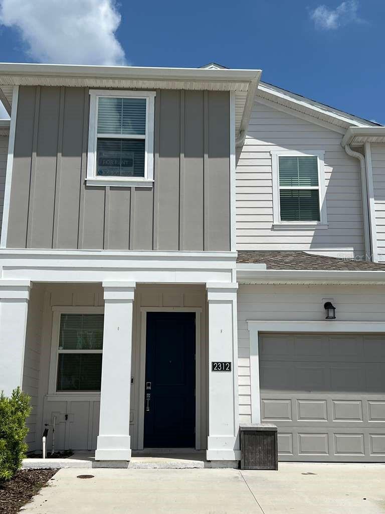 Built in 2023, this property offers 3 bedrooms, 2.5 bathrooms, and approximately 1,793 square feet of living space thoughtfully designed to meet the needs of modern living. Upon entering, you'll find a bright and inviting atmosphere with an open-concept design that maximizes functionality and spaciousness. The kitchen flows seamlessly into the dining and living areas, creating an ideal environment for everyday living and for sharing special moments with family and friends. Abundant natural light enhances every space, contributing to a pleasant sense of spaciousness and comfort. The spacious primary suite offers privacy and comfort, complemented by an ensuite bathroom and ample storage. The secondary bedrooms provide flexibility to accommodate family members, guests, or even a home office. Additional features include a one-car garage and a private outdoor area, perfect for relaxing and enjoying the Florida lifestyle. Strategically located in Kissimmee, this property boasts quick access to US-192 and I-4, providing convenient connections to Walt Disney World, shopping centers, restaurants, entertainment venues, and other major Central Florida attractions. Whether you're seeking a primary residence, a second home, or an investment opportunity, this property is an excellent choice in one of the region's fastest-growing and most developed areas. Its prime location, modern design, and attractive features also make it an appealing option for those looking for a property with long-term investment potential.