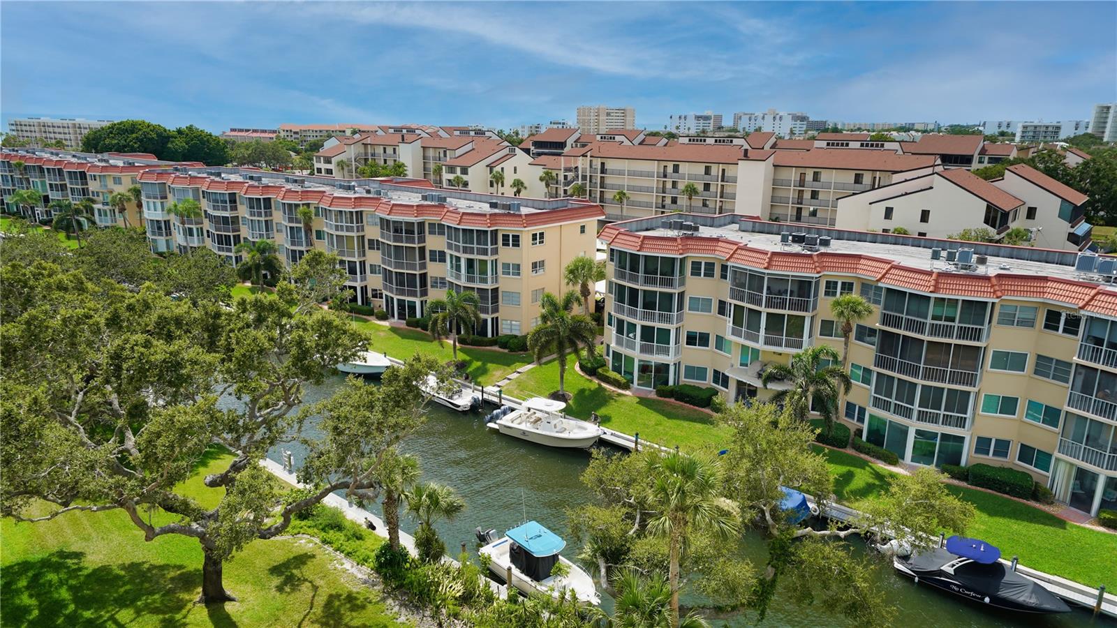 Siesta Key Canal front Penthouse condo with beach access (#1 beach is directly across the street!).  Boat slip available.  Direct views of the intercoastal waterway and partial views of the Gulf.  You'll see water from the bedrooms, kitchen, great room and of course the lanai. 
Book a live or virtual tour now to get a better understanding of how great these views are!
You'll love this Penthouse in the exclusive Pompano building, located just north of the Stickney Point Bridge on Midnight Pass Road.  It overlooks the Intercoastal Waterway and has a view of the Gulf of Mexico across the street, with a panoramic view from Downtown Sarasota out to the Keys.  The two bedroom, two-bath split plan is 1,135 square feet, plus a spacious lanai extending the whole length of the condo (50' by 8') adds another 390 sq ft of space.
The open concept features a kitchen with granite counters, including a large half-moon seating area.  The stovetop is induction and all other appliances are stainless.  Tile and wood laminate floorings throughout, for easy cleaning.  Tray ceiling in the kitchen and brand new ceiling fans throughout.
Additional features include:
Deeded access to Crescent Beach, voted the #1 Beach in the United States.  Pool and hot tub surrounded by glass walls, located right on the Intercoastal.  Spacious social room seating 50+ guests with full kitchen & billiards table, free of charge to residents.  Covered parking garage with assigned spot.  Private fishing pier.  Boat slip available.  30' max size boat approximately $1250/ year.  Fitness room.  No Pets.