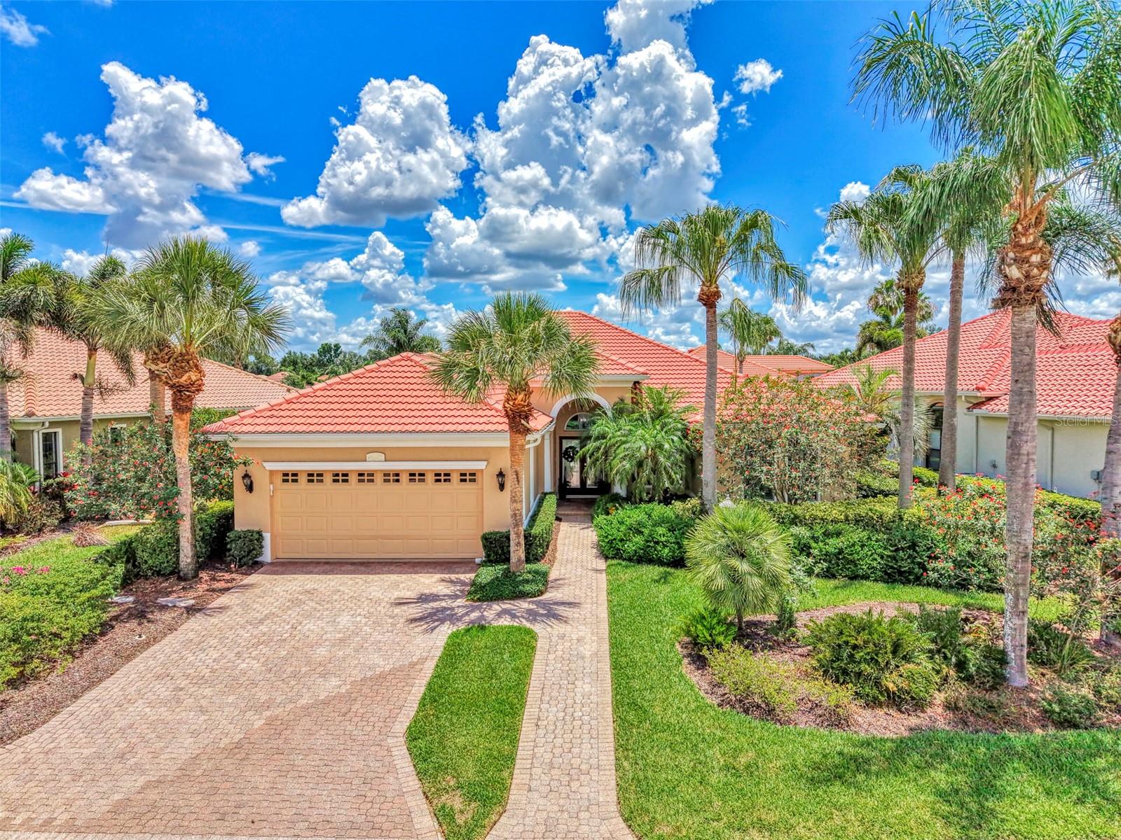 Located behind the gates of the highly sought-after Lakewood Ranch Country Club, this beautifully updated residence at 13987 Siena Loop showcases luxurious upgrades, timeless design, and an exceptional Florida lifestyle. Thoughtfully renovated throughout, the home offers the perfect blend of elegance, comfort, and modern functionality.
At the heart of the home is the stunning 2025 chef’s kitchen remodel, designed with both beauty and performance in mind. Featuring gorgeous Cambria quartz countertops and backsplash, solid wood cabinetry, a gas range, new refrigerator, Sharp microwave drawer, and under-mounted hidden outlets for a sleek, seamless finish, this space is truly built to impress.
The luxurious primary bathroom has also been completely transformed in 2025, creating a spa-like retreat with Cambria quartz countertops, solid wood cabinetry, backlit anti-fog mirrors, porcelain tile flooring and shower, an electric remote blind, and a stunning curbless walk-in shower.
Additional recent upgrades provide peace of mind and modern convenience, including 2022 impact windows and sliders, hurricane shutters for the front door, a panoramic-view lanai cage, 2023 HVAC system and gas water heater, all new interior doors, and fresh interior paint throughout.
Step outside to the expansive lanai where panoramic views create the perfect backdrop for relaxing or entertaining while enjoying Florida’s year-round sunshine. A built-in outdoor grill adds the perfect touch for casual cookouts and outdoor dinning while taking in the peaceful setting.
Residents enjoy optional social, sports, and golf memberships with access to championship golf, tennis, fitness, dining, and an active social lifestyle within Lakewood Ranch Country Club. Conveniently located just minutes from Waterside Place, world-class shopping and dining, downtown Sarasota, and the renowned Gulf Coast beaches, this exceptional home offers luxury living in one of the area’s most premier communities.