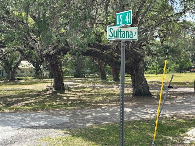 Nice 1.25+ acre site with large beautiful trees that has been cleared and basically prepped for development.  Lot is a combination of 5 lots mol. 1-150' X 150' Lot directly on US Hwy 41 with lots of possibilities such as Office/Residential or even some type of low intensity commercial.  Parcel also includes 4 Residential Mobil Home Lots 50' X 180' prime for development because they are already directly on Kanawha Lane. Site has lots of potential from potential Mobil/Modular home park to possibly several Single Family Residential lots to possible several Office/Residential (OR) Agricultural business sites. Lots of Development working it way up US Highway 41 from SR 52.