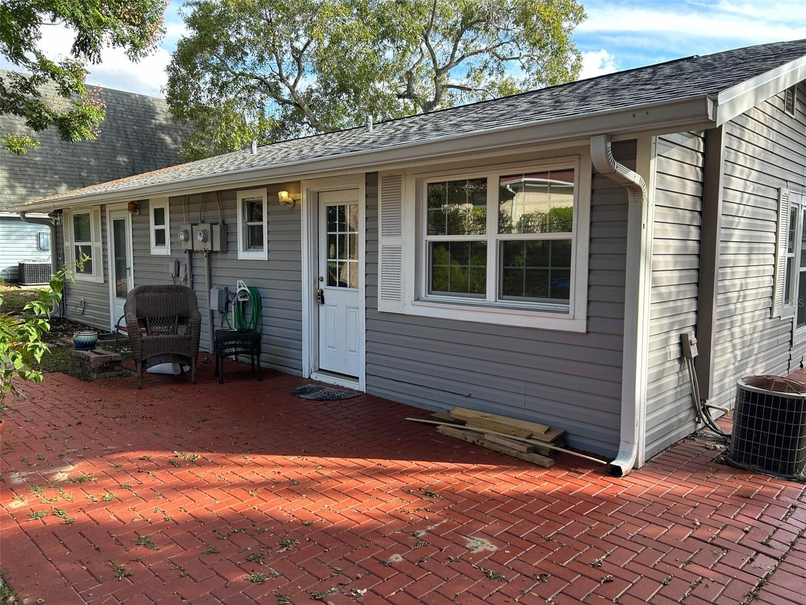 1 bath - Studio - newer roof, windows and A/C - needs TLC - Vacation Village is gated with lake access to Lake Louisa and the Clermont Chain of Lakes.