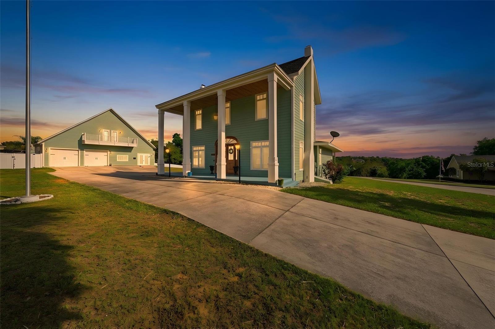 Own a Piece of History – Charming 1881 Colonial-Style Home with In-Law Suite, Lake Access & No HOA

Originally built in 1881, this inviting Colonial-style property offers a rare blend of historic character and modern functionality. The 4-bedroom, 3-bathroom main home, updated in 2006, features comfortable living spaces and timeless details throughout, including beautiful hardwood floors.

The kitchen is designed for both everyday living and entertaining, featuring stainless steel appliances, a double oven, an oversized island, and a cozy breakfast nook.

Enjoy the charm of both a welcoming front porch and an expansive wraparound porch, offering plenty of space to sit, relax, and take in the surrounding scenery—perfect for morning coffee or unwinding in the evenings.

The home features a fireplace in the living room as well as a fireplace in the main-floor primary suite, adding warmth and character. The primary suite is conveniently located on the main floor. A standout historic feature is the original banister from 1881, showcasing craftsmanship and charm that is hard to find.

Additional flexible space includes a bonus room with French doors, ideal for a home office, workout room, or flex space.

The property includes access to Lake Nettie, enhancing the peaceful, natural setting, and is conveniently located just minutes from downtown Eustis and Mount Dora, with easy access to the 429 for commuting.

A valuable addition is the detached 2-bedroom, 2-bath mother-in-law suite offering approximately 1,056 sq ft of living space, complete with a living room, kitchen, and bathroom on the main level, and two bedrooms and a full bathroom upstairs. The suite also includes washer and dryer hookups and is connected to a two-car garage, offering excellent income-producing potential or space for extended family and guests.

Recent updates include:
 • HVAC system replaced in 2025
 • New backyard shed for additional storage.

With NO HOA, this property offers the freedom to enjoy your space while taking advantage of its unique features, charm, and versatility.

Do not miss this opportunity to own a piece of Florida history.
FREE 1-0 Temporary Buydown Rate through the seller’s preferred lender.  This is a lender-paid rate buydown that reduces the buyer’s interest rate and monthly payment through the end June.