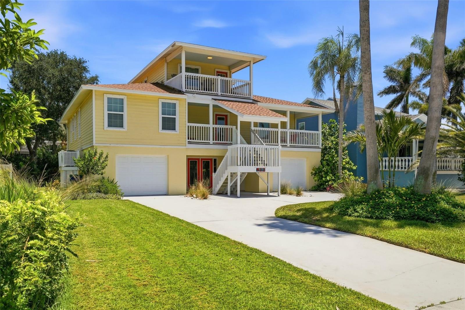 Island living, waterfront adventures, and some of Florida's most beautiful beaches—all just minutes from your front door. Welcome to the Monte Cristo community in Tierra Verde, one of Tampa Bay's most sought-after coastal neighborhoods, where boating, biking, nature, and waterfront dining are part of everyday life.

This spacious 4-bedroom, 2.5-bathroom Key West-style home offers the perfect blend of comfort and functionality. Filled with natural light, the open floor plan is designed for both everyday living and entertaining. The kitchen features stainless steel appliances and a breakfast bar, flowing seamlessly into a dining area and the living room with a wood-burning fireplace and access to a covered porch overlooking the peaceful, tree-shaded backyard.

The flexible layout includes three bedrooms on the main living level, while the private primary suite occupies the upper floor, creating a true retreat complete with dual walk-in closets and a spacious ensuite bathroom. A bonus area upstairs provides the perfect space for a home office, reading nook, or fitness area. On the ground level, a two-car split garage and bonus room offer additional flexibility, with sliding glass doors opening to the shaded patio and backyard for effortless indoor-outdoor living.

Outside, the backyard provides plenty of room to create your own outdoor oasis, with space for a future pool and the option to add an elevator if desired.

Additional Highlights: Roof 2023, newer kitchen appliances (2021–2023), Water Heater 2022, HVAC systems (2017 & 2014), deck and stairs replaced in 2017.

Tierra Verde is perfectly positioned between award-winning St. Pete Beach and Fort De Soto Park, where miles of sandy beaches, walking trails, fishing piers, boating access, and a dog beach await. Residents enjoy a relaxed island lifestyle while remaining just minutes from vibrant Downtown St. Petersburg, known for its waterfront parks, museums, restaurants, shopping, and entertainment. Many locals consider Tierra Verde one of St. Pete's best-kept secrets—offering the tranquility of island living without sacrificing convenience.

Don't miss your opportunity to own a piece of paradise in one of Florida's most desirable coastal communities. Schedule your private showing today.