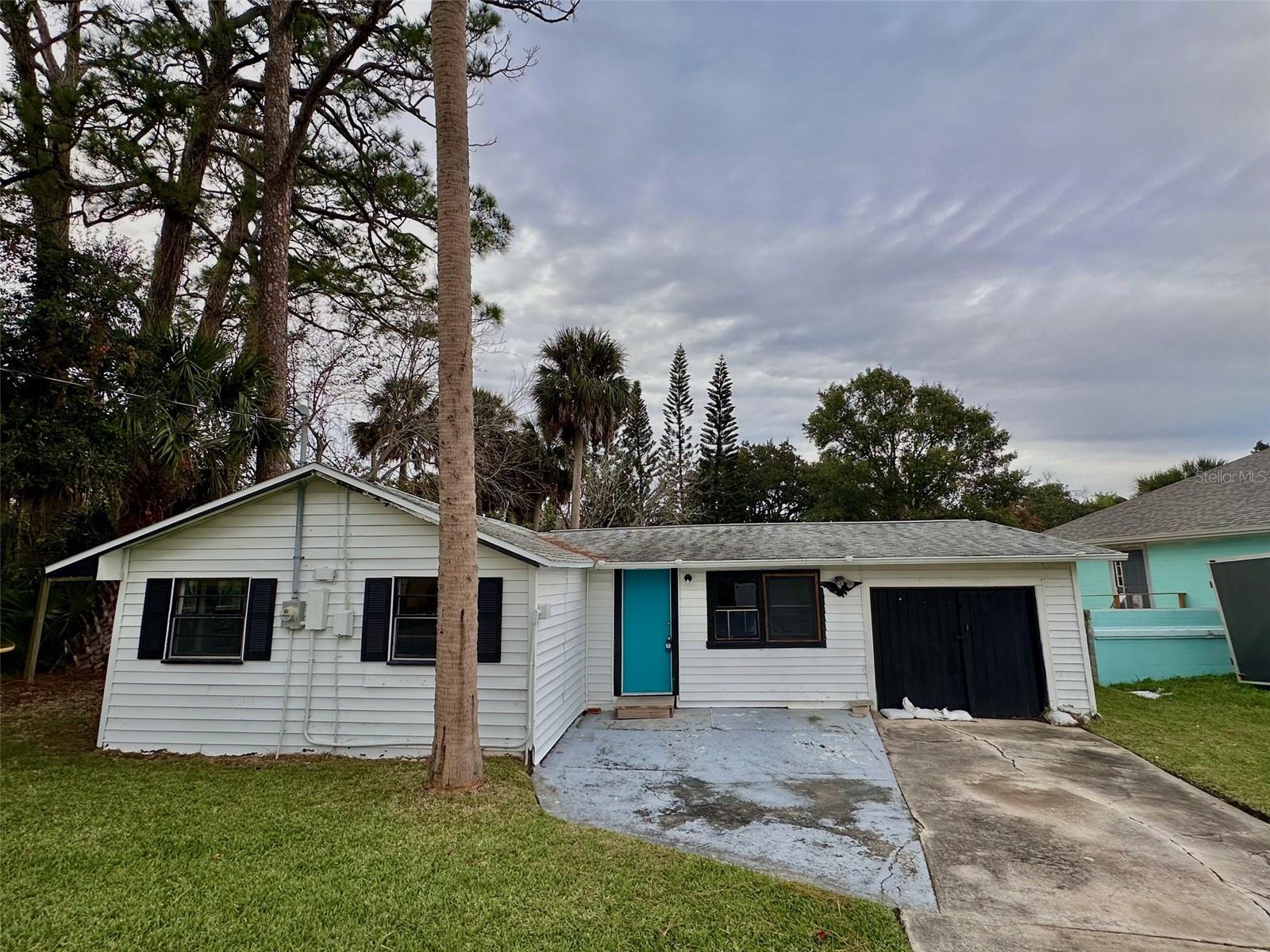 Don't hesitate to seize this opportunity! With a reduced price due to hurricane damage, this property holds immense potential for those looking to invest or flip. Although the plumbing system is original, the sewer lines from the street to the home have already been replaced, saving you time and effort. Imagine the possibilities of transforming this rustic 2-bedroom, 2-bathroom home. Not only does this property offer a peaceful retreat, but it is also conveniently located near shopping, dining, and the beach. The large yard provides ample space for outdoor activities and potential landscaping projects. Additionally, the oversized main bedroom adds a touch of luxury and comfort to the home. Don't let this opportunity slip away! Make an appointment to see the property today and explore its full potential. Whether you're looking for a profitable rental investment or a rewarding flip, this property has the potential to be a gem in your real estate portfolio.
