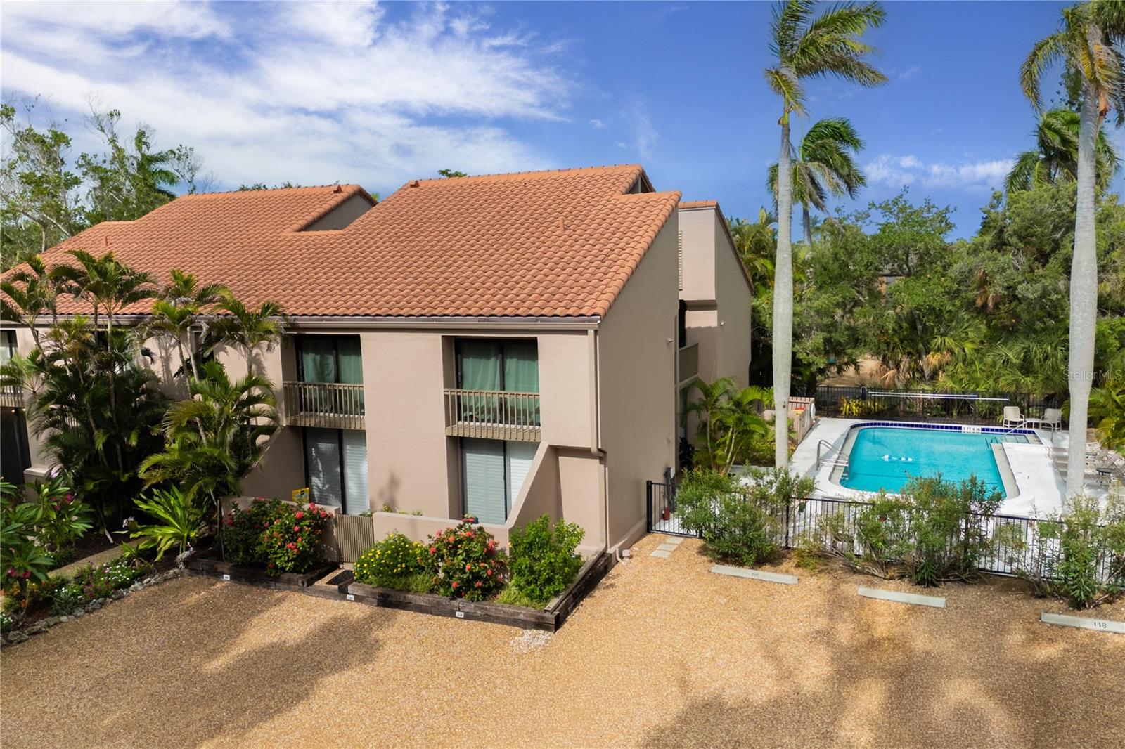 Opportunities to own in Sandy Cove are rare—and this residence presents the perfect chance to create your own island retreat in one of Siesta Key's most sought-after waterfront communities.

Bring your vision and transform this well-located residence into the coastal getaway you've always imagined. Whether you're looking for a winter escape from the cold, a seasonal home to enjoy for years to come, or an investment in one of Florida's premier beach destinations, the value here lies in the location, lifestyle, and potential.

Designed by renowned Sarasota architect Frank Folsom Smith, Sandy Cove is a boutique waterfront community celebrated for its timeless mid-century architecture, lush tropical landscaping, private shell beach, fishing pier, heated pool, kayak launch, and Gulf-front sunsets. Best of all, you're just a short stroll from Siesta Key Village, where local restaurants, boutiques, live music, and island charm await.

Unlike buying someone else's renovation, this home offers the rare opportunity to update the interior to reflect your own style while investing in a community where demand remains consistently strong. Enjoy the property today, renovate at your own pace, and own a piece of Siesta Key in a location that continues to attract vacationers, seasonal residents, and investors alike.

When the address is this exceptional, the possibilities are endless. Schedule your private showing today!