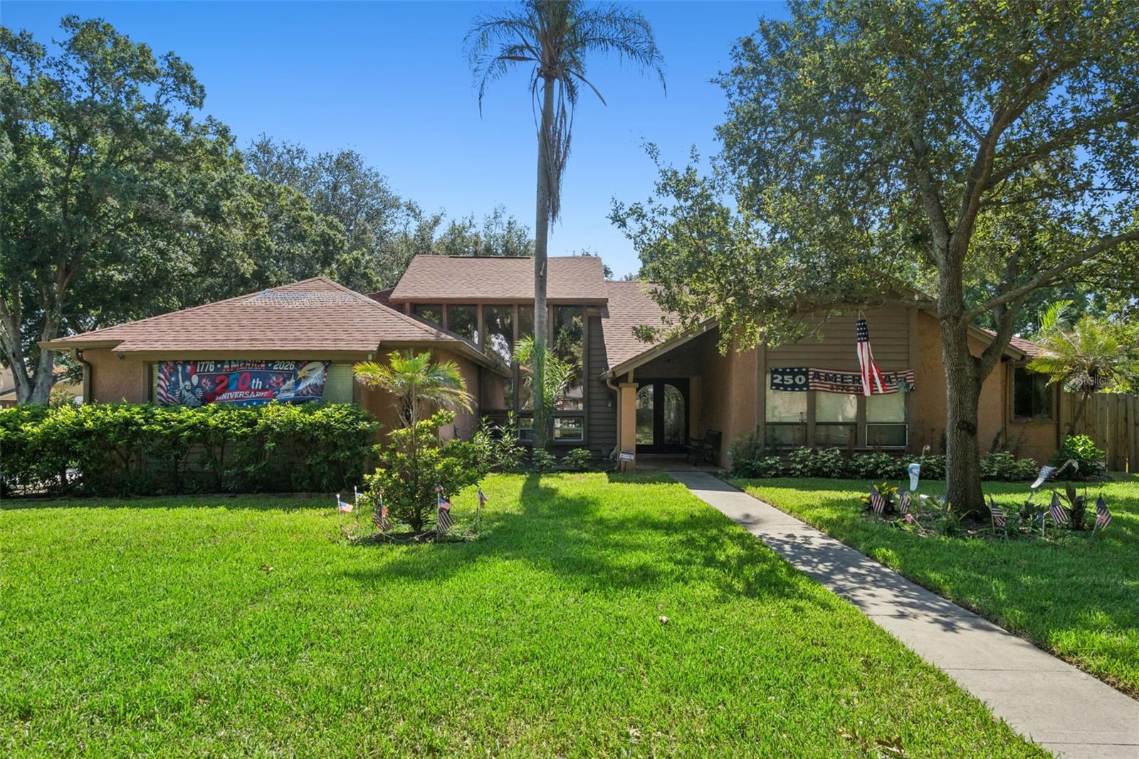 Virtually Staged. Welcome to this inviting pool home situated on a spacious corner lot in the highly desirable Dr. Phillips area. Step inside to a bright and open family room featuring 18 ft ceilings allowing abundant natural light. The home features a versatile bonus room offering endless possibilities as a home office, playroom, fitness room, or additional living room.

The thoughtfully designed split-bedroom floor plan provides added privacy, with three secondary bedrooms, Jack & Jill bathroom, and a convenient pool bath located opposite the primary suite. The spacious primary features en-suite bath with dual vanities and Jacuzzi tub and the French doors in bedroom open to your private, fenced backyard.

Designed for both relaxation and entertaining, the outdoor space features a sparkling 6-foot-deep pool, a new 14' x 10' wood pergola on stone pavers, Solaire infrared grill and premium OW Lee gas fire pit. The enclosed patio is enhanced by a new summer kitchen (2026) complete with electric cooktop, exterior-vented exhaust hood, modern cabinetry, quartz countertops, and a sink.

Updates include a newer roof (2022), two newer A/C units, St. Augustine sod (2026) in the front and side yards, and functional irrigation system to keep the landscaping lush year-round. ARLO security camera system for peace of mind.  Side-entry garage offers additional shelving, pull-down attic access for extra storage, and a concrete step cutout designed to accommodate a longer vehicle. ARLO security camera system is included for peace of mind

Located in Bay Springs community with low HOA fees, this home is just minutes from Restaurant Row, world-class shopping and dining, top-rated schools, and major highways. Enjoy convenient access to Universal Orlando Resort, as well as Walt Disney World Resort, SeaWorld Orlando, and the attractions of International Drive.