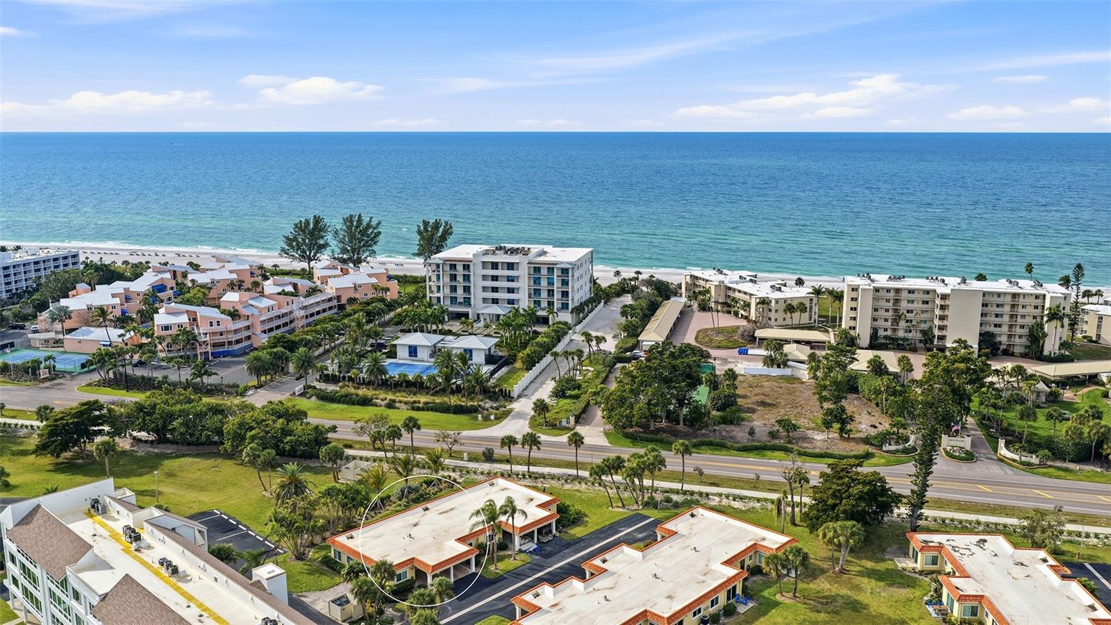 Welcome to coastal luxury living in Windward Bay, one of Longboat Key's most sought-after waterfront communities. Perfectly positioned between the sparkling waters of Sarasota Bay and the pristine Gulf beaches, this completely renovated 2-bedroom, 2-bath villa offers an exceptional blend of modern elegance, resort-style amenities, and the coveted island lifestyle buyers dream about.  Fully reimagined and rebuilt from the studs, this stunning residence showcases high-end craftsmanship and designer finishes throughout. Every detail has been thoughtfully upgraded, including brand-new electrical systems, plumbing, drywall, insulation, kitchen, bathrooms, fixtures, and finishes—providing the peace of mind and comfort of essentially new construction within an established waterfront community.
The bright, open-concept floor plan is flooded with natural light and designed for effortless indoor-outdoor living. The beautifully appointed chef's kitchen flows seamlessly into the living and dining areas, creating an inviting space ideal for entertaining, seasonal gatherings, or everyday enjoyment. A dedicated 220-volt outlet offers convenient electric vehicle charging, adding modern functionality and future-ready convenience.
One of the villa's most desirable features is its easy ground-level access with no stairs, making everyday living simple and accessible. Pet lovers will appreciate Windward Bay's generous pet-friendly policy allowing up to two pets, a rare and highly desirable amenity on Longboat Key.
Step outside to your private patio retreat surrounded by lush tropical landscaping and mature greenery. Enjoy peaceful mornings with coffee, spectacular sunset skies, and relaxing evenings gathered around the fire pit just moments from beach access. The Gulf of Mexico is only steps away, offering endless opportunities for shelling, beach walks, swimming, paddleboarding, and breathtaking sunsets.
Residents of Windward Bay enjoy an unmatched collection of resort-style amenities set across nearly 27 acres of beautifully maintained waterfront property, including: Three beach access points to the powdery sand beaches of Longboat Key. Nearly one-half mile of scenic waterfront walking paths and nature trails.  Two heated swimming pools.  Six tennis and pickleball courts.  Fitness center, sauna, clubhouse, library, and social gathering spaces.  Two private marinas with boat slips and jet ski slips (for rent and subject to availability).  Private fishing pier with panoramic bay views.  Kayak storage and launch areas.  Outdoor grilling stations, fire pits, and waterfront gathering areas.  Lush park-like grounds with mature tropical landscaping. Whether you're searching for a primary residence, seasonal retreat, second home, snowbird escape, waterfront villa, beach getaway, or investment opportunity, this move-in-ready residence offers an unparalleled combination of location, lifestyle, and value. Ideally located minutes to St. Armands Circle, Sarasota's vibrant arts and dining scene, championship golf courses, boating destinations, waterfront restaurants, and world-renowned Gulf Coast beaches, this exceptional property delivers the very best of Longboat Key living. Experience the ultimate in island living where luxury, comfort, boating, beach access, and resort-style amenities come together in one extraordinary coastal retreat.