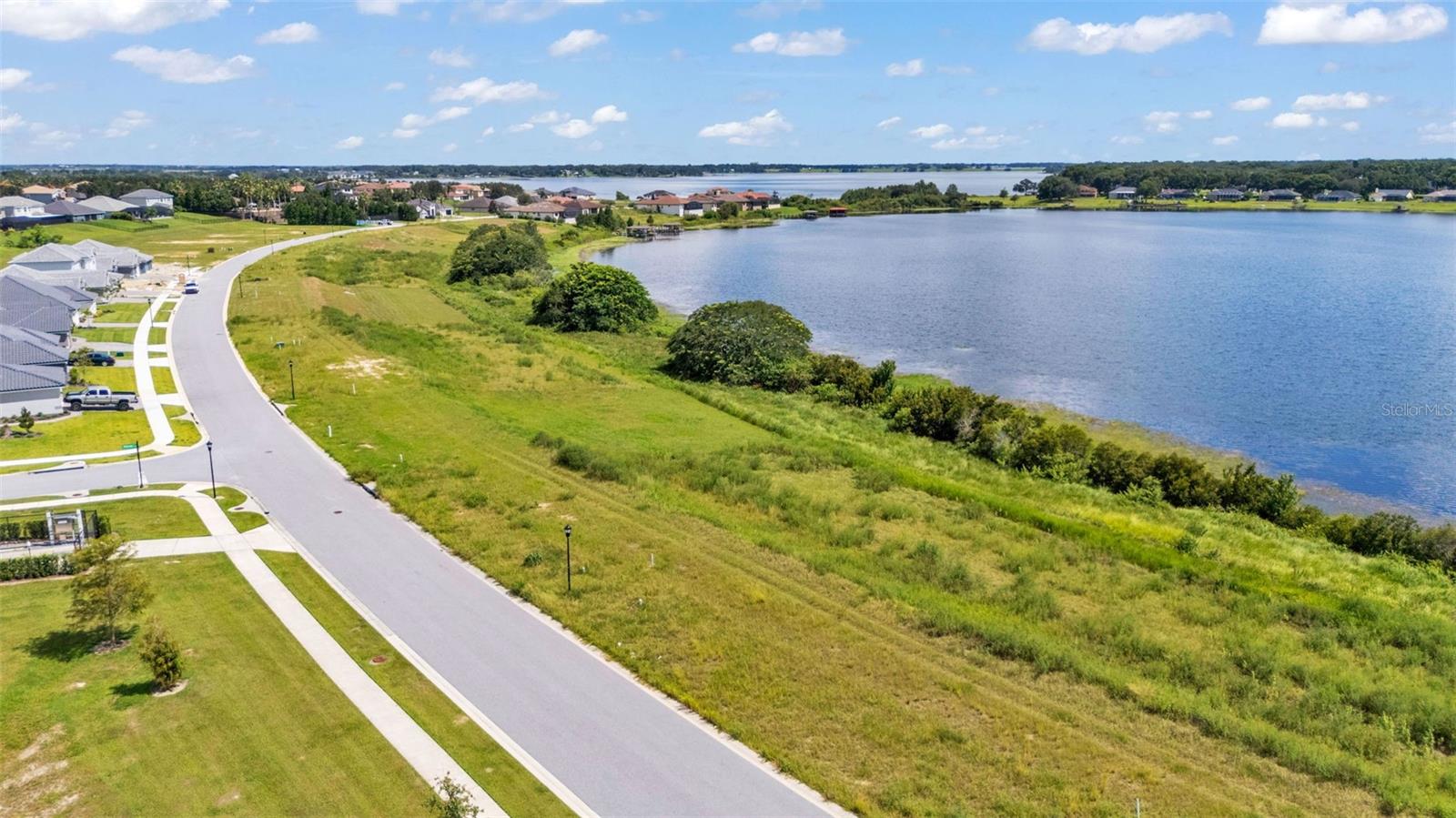 **Beautiful Lakefront Lot in Gated Lake Juliana Estates!**
click video link for community tour 

This exceptional property offers **100 feet of true waterfront on Lake Tennessee**, providing the perfect setting to build your dream home. The lot has already been cleared all the way to the shoreline, giving you unobstructed views of the **108-acre public lake**—ideal for boating, water skiing, fishing, and more.

Lake Juliana Estates is an **upscale, gated community** featuring **resort-style amenities**, including:

* Fitness center
* Tennis courts
* Pickleball courts
* Clubhouse
* Community boat ramp with access to Lake Juliana

Conveniently located near **I-4**, this property offers an easy commute to both Orlando and Tampa while letting you enjoy peaceful lakefront living. This Community is in zone for A rated schools and is walking distance from shopping  and restaurants.

---