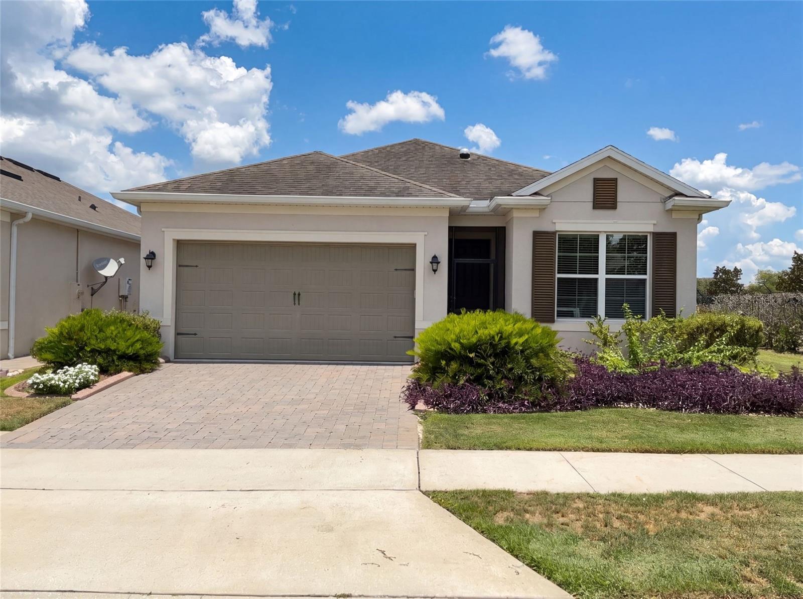 Virtually Staged. 2185 Antilles Club Dr is a one-story Kissimmee corner home built in 2018 with modern finishes and a well-designed layout throughout. The kitchen features a center island, stainless steel appliances, quartz countertops, a walk-in pantry, ample counter space, and abundant cabinet storage, creating a fully equipped space for cooking and entertaining. The primary bedroom includes a walk-in closet for convenient storage and organization, while the primary bathroom features double sinks for everyday convenience. An in-ground pool extends the living space outdoors, creating an expansive area for relaxation and entertaining. A two-car garage completes this well-maintained residence with practical amenities and comfortable living spaces throughout every room.. Included 100-Day Home Warranty with buyer activation