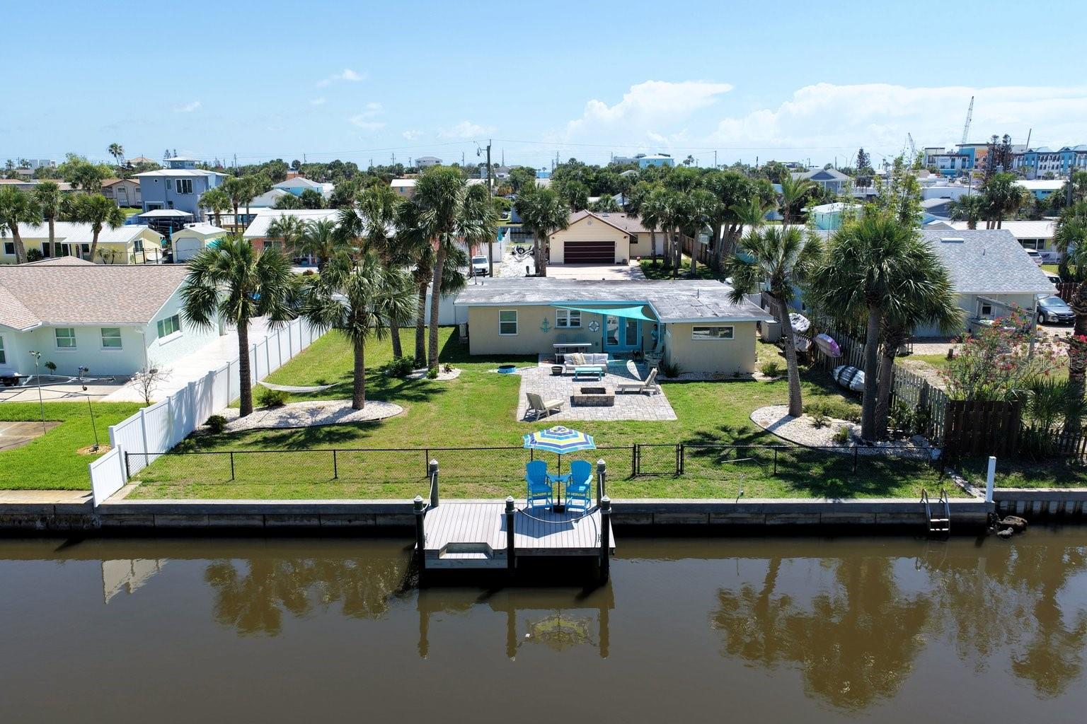 PRICE REDUCED + NEW ROOF COMING SOON...NOW IS THE TIME TO BUY!
Don't miss this incredible opportunity to own an updated waterfront home in one of Flagler Beach's most desirable locations. With a significant price reduction, a brand-new roof scheduled for installation, and direct canal access to the Intracoastal Waterway, this property delivers exceptional value and the ultimate Florida lifestyle.
Bring your boat! The brand-new dock and concrete seawall make it easy to spend your days cruising the Intracoastal, fishing from your backyard, kayaking, paddleboarding, or heading out for sunset cruises. Best of all, you're just four blocks from the Atlantic Ocean and within walking or biking distance to Flagler Beach's restaurants, shops, live music, and charming beach-town atmosphere.
The oversized homesite offers features rarely found this close to the beach, including a dedicated RV parking area with hookups, plenty of room for your boat and trailer, a fully fenced backyard, and a custom paver patio with a built-in fire pit—perfect for entertaining family and friends.
Inside, you'll appreciate the many updates already completed, including refreshed bathrooms, updated lighting, a new stove, newer kitchen appliances, a tankless water heater, and an energy-efficient four-zone mini-split HVAC system with dual compressors. Additional upgrades include irrigation on a private well and newer fencing.
Whether you're searching for a primary residence, weekend getaway, vacation rental, or investment property, this move-in-ready waterfront home checks every box. Opportunities to own a canal-front property with a new dock, upcoming new roof, oversized lot, RV parking, and beach access at this price are becoming increasingly rare.
Schedule your private showing today and discover why life is simply better on the water in beautiful Flagler Beach!