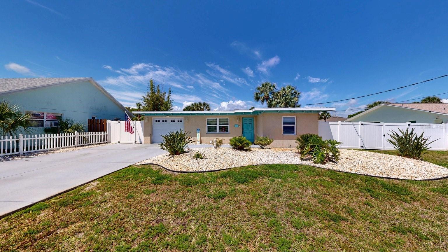 Calling all boaters and fishermen—this is the waterfront lifestyle opportunity you’ve been waiting for in Flagler Beach. Perfectly positioned on a scenic canal and located just four blocks from the Atlantic Ocean, this beautifully updated home offers the ultimate combination of boating access, beach proximity, and relaxed coastal living.
Featuring a brand-new dock with concrete seawall, this property is built for life on the water. Bring your boat, kayaks, paddleboards, and fishing gear and enjoy easy access to endless days on the Intracoastal and nearby waterways. Fish from your own backyard, spend mornings on the boat, then walk or bike to the beach in minutes.
The oversized, professionally landscaped lot provides plenty of room for all your recreational needs, including an RV pad with hookups and a fully fenced backyard perfect for pets, entertaining, or storing water toys and equipment. After a day on the water, unwind around the custom paver patio with built-in fire pit and enjoy the coastal breeze.
Inside, the home has been thoughtfully upgraded with new light fixtures throughout, updated bathroom vanities and fixtures, a new stove (2026), and newer washer, dishwasher, and refrigerator (2023). Additional improvements include a tankless hot water heater and an efficient four-zone mini-split A/C system with two compressors (2019) for year-round comfort.
Additional highlights include irrigation on its own private well and new fencing installed in 2023.
Best of all, you’re within walking distance to Flagler Beach’s popular restaurants, local bars, shops, and entertainment, making this the perfect primary residence, vacation retreat, or coastal getaway for anyone who loves boating, fishing, and beach living.