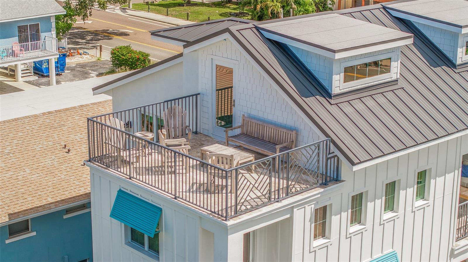 Welcome to Ocean Pearl on 18th, a newly built luxury beach townhome that defines refined coastal living—just steps from the sugar-white sands of Indian Rocks Beach. One of only two residences in an exclusive architectural pairing, this home offers the privacy and feel of a single-family residence with the convenience of condo living and no association fees.

Completed in 2023, the property was engineered for strength and peace of mind. Steel-reinforced concrete block construction, hurricane-impact windows and sliders, and a flawless performance through Hurricanes Helene and Milton underscore its exceptional durability. Offered fully furnished and completely turnkey, this is a rare opportunity to own a luxury beach retreat just two homes from the shoreline.

Spanning more than 2,450 square feet, the residence features four bedrooms and three full bathrooms, plus a third-floor recreation/bonus room with a pull-out sofa—comfortably accommodating up to 12 guests. The open-concept main living level is ideal for gathering and entertaining, anchored by a chef’s kitchen outfitted with premium appliances that make hosting effortless.

Multiple decks and living spaces capture direct ocean views, while the expansive third-floor deck delivers stunning sunset vistas—perfect for unwinding after a day at the beach. Outdoors, enjoy your private heated pool, located just moments from beach access.

Additional features include:

Direct ocean views from multiple rooms and decks

Elevator-ready (shaft in place)

Two-car garage

Private heated pool

Walkable to top-rated restaurants and local favorites

Estimated 2025 gross rental revenue of $140,000+

Approximate annual taxes of $12,000

Whether you’re seeking a luxury coastal escape, a strong income-producing investment, or both, Ocean Pearl on 18th offers an exceptional combination of location, construction quality, rental performance, and beachside lifestyle—an increasingly rare find in one of Indian Rocks Beach’s most desirable settings.