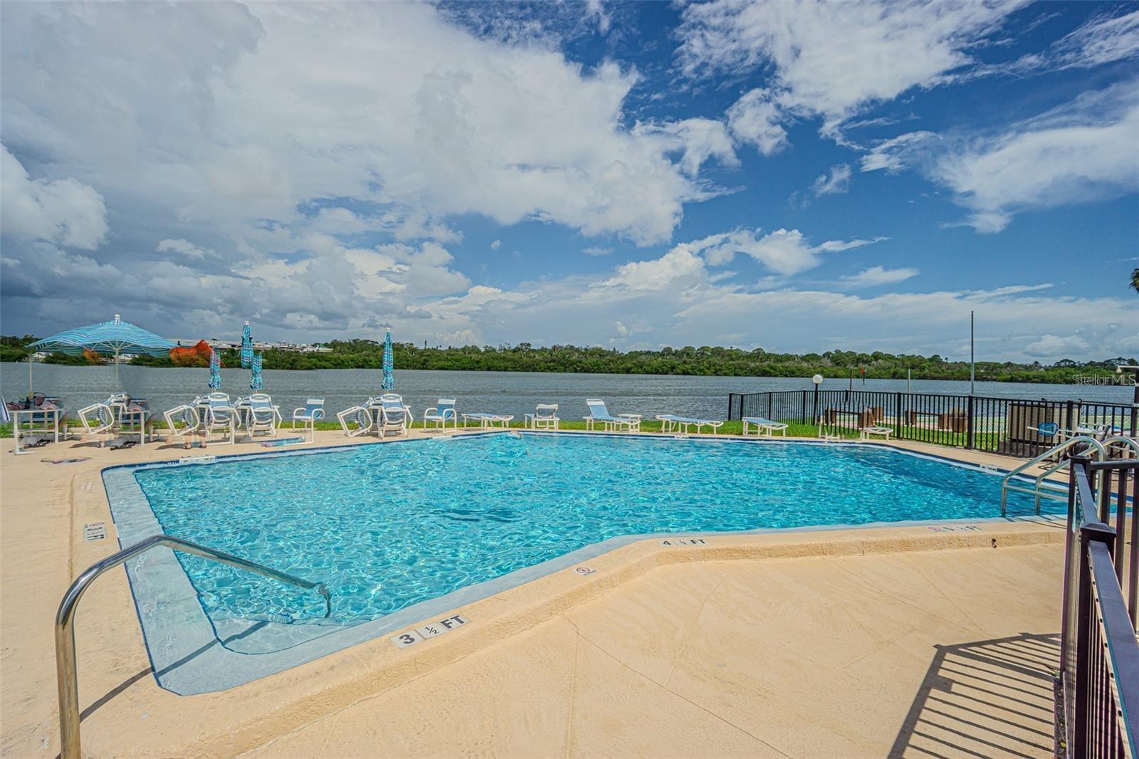 ** UNIT OPEN FOR SHOWINGS UNTIL THE -26th!  This unit is a CASH COW! ** 2ND FLOOR UNIT! BEST priced unit in the community *** (2 BED 2 BATH Sleeps 6 )  30 Day Rentals!  Buy as a desired vacation rental or second home! ALL ages welcomed! UNIT COMES FULLY FURNISHED and TURNKEY with linens, extra pull out bed, beach chairs, fishing pole and so much more. LAUNDRY INSIDE UNIT! ASSIGNED COVERED PARKING & STORAGE steps from the unit. (AC 2017) Welcome to your piece of paradise with a view, in the heart of Indian Rocks Beach less than half a mile from the beach! This this tastefully updated, well appointed and meticulously maintained two-bedroom, two-bathroom condo is nestled in a very unique community that offers the ideal coastal lifestyle. As you step inside, you'll be immediately struck by the abundance of natural light that fills the living space, accentuating the beautiful new laminate flooring throughout. Master bedroom is very spacious with a large walk in closet and en suite bathroom. 2nd Bedroom has dual closets. Large enclosed Bonus Florida Room with a storage closet off the back of the unit. This unique community offers an array of fantastic amenities, including a clubhouse, a refreshing waterfront pool, shuffleboard courts etc.  Picture yourself spending your leisure time by the poolside, savoring the Florida sunshine, and making new friends among your neighbors.  Unit comes fully furnished and ready to rent or move in, just bring your swimsuit! Everything currently in the unit will convey to the new owners.*** HOA FEE COVERS, Cable TV, Internet, Pest, sewer, trash, water, community pool, exterior maintenance, grounds maintenance and more, ensuring hassle-free living. This unit will not last! Great income producing unit!