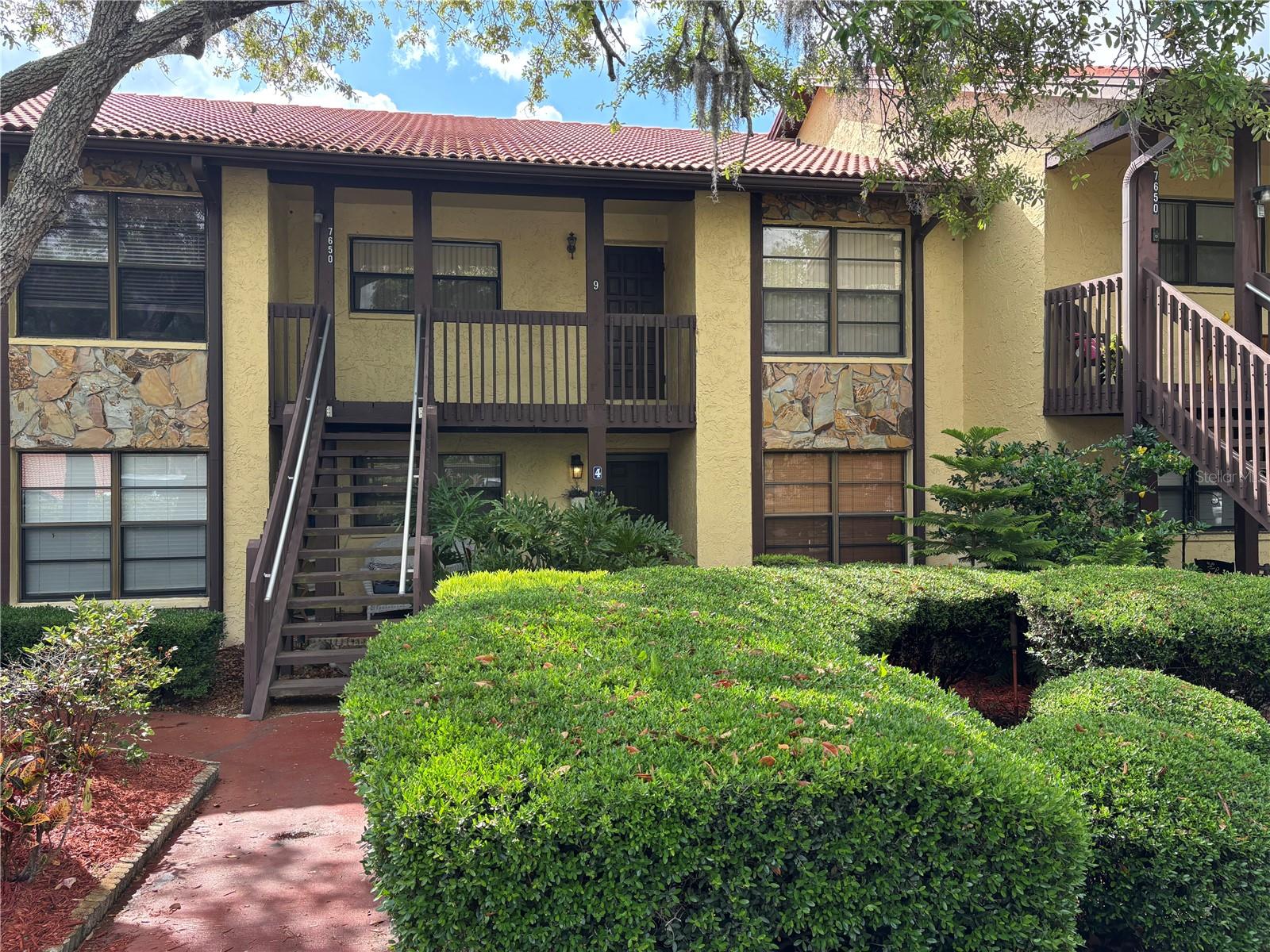 EXTREMELY WELL CARED FOR CONDO IN THE HIGHLY DESIRABLE FOREST LAKES COMMUNITY!  LARGE KITCHEN AREA, TILE & WOOD FLOORING, CATHEDRAL TYPE CEILINGS, LOTS OF NATURAL LIGHTING, LARGE LIVING/DINING ROOM COMBO, A BUILT IN BAR AREA, STUNNING LANAI WITH WILDERNESS VIEWS, LARGE PRIMARY BEDROOM INCLUDING AN EN SUITE BATHROOM AND A WALK IN!  ALSO PROVIDING INSIDE LAUNDRY, CEILING FANS THROUGHOUT AND MORE!! LOW HOA FEE WHICH INCLUDES, CABLE TV, INTERNET, WATER, TRASH, SEWER, PROPERTY MAINTENANCE AND ACCESS TO THE BEAUTIFUL CLUBHOUSE WHICH OFFERS A POOL, FITNESS CENTER, RECREATIONAL FACILITIES AND A LIBRARY AREA!  THIS COMMUNITY IS VERY CLOSE TO SHOPPING, RESTAURANTS, MEDICAL, PARKS, BEACHES AND MUCH MUCH MORE!!  ALSO JUST A SHORT DRIVE TO US 19 AND THE SUNCOAST PARKWAY!  THIS ONE IS VERY WELL PRICED AND A MUST SEE!