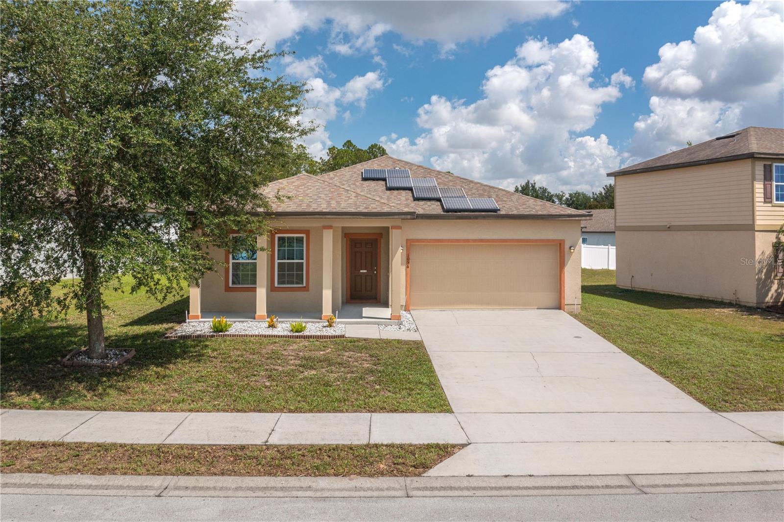 Welcome Home to this beautiful 3-bedroom, 2-bath home in the desirable Whispering Ridge community of Lake Wales! The seller is offering a $10,000 credit to the buyer with an offer at or near the list price, providing flexibility for closing costs or an interest rate buy-down. Enjoy the benefits of low HOA fees, underground utilities, sidewalks, and charming streetlights throughout the neighborhood. Inside, the open floor plan offers comfortable living with a spacious kitchen, pantry, inside laundry room, and a generous primary suite featuring an en-suite bath and large walk-in closet. Step outside to a fully fenced backyard with a deck, perfect for entertaining, relaxing, or enjoying Florida's beautiful weather. The home's solar panels have helped significantly reduce monthly electric costs, adding valuable energy savings. The community offers a playground for little ones. Outdoor enthusiasts will love the proximity to some of Central Florida's most popular fishing and recreation destinations, including Lake Kissimmee, Lake Rosalie, and Lake Walk-in-Water, known for world-class bass fishing, boating, and outdoor adventures. Conveniently located near shopping, dining, medical facilities, schools, parks, and major roadways, this home offers the perfect blend of comfort, convenience, and Florida living.
