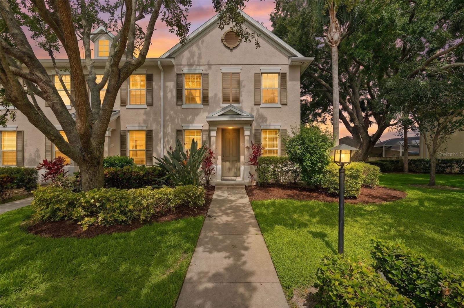 Maintenance free end-unit townhome in The Harborage, a gated community on the Braden River with a community marina, clubhouse, fitness, pool and spa, canoe & kayak launches, walking trails. This home is renovated and looks brand new! Natural light and upscale finishes throughout. Entertainer's kitchen includes 134" X 42" center island with breakfast bar. Great room and dining room is ideal space for large or intimate groups. Sliding glass doors to private courtyard and two-car garage with EV hookup. Primary bedroom has walk-in closet, standard closet, and en-suite bath with dual sinks, walk-in shower, and lighted mirrors. Bedrooms 2 and 3 share a main hall bath with single sink, shower/tub, and linen closet off the large landing hallway. The lighted laundry room and storage room is underneath the steps. AC with dual-zoned thermostat replaced 2023, new roof 2022, new gutters with covers installed 2026. This home is meticulously kept. Attention to detail was given during the remodel to include cabinet lighting, additional outlets, and optimal storage without interrupting the open flow of the home. A unique feature is how the road curves at the front and gives a lot of open yard space beside this home. Guest parking available! The Harborage on the Braden River is a Key West vibe neighborhood with single family residences, townhomes, and condos with a very pedestrian-friendly structure. This stretch of the Manatee River has indirect access to the Gulf. The nearest beaches are Anna Maria Island, Siesta Key, Lido Key. Also nearby are the Bradenton Riverwalk, fine dining, shopping, and entertainment venues for all ages.