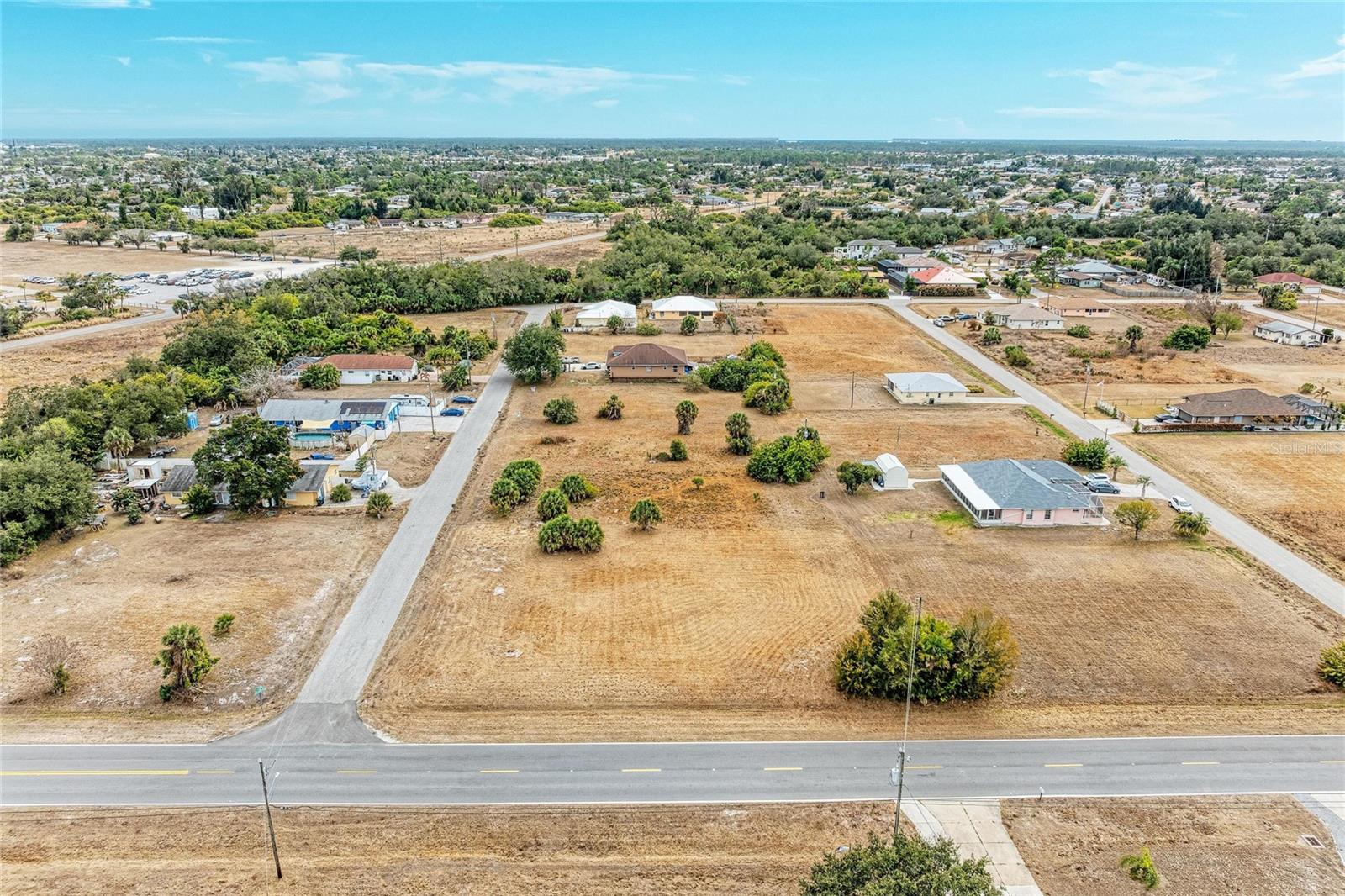 THE ULTIMATE WELLNESS RETREAT TRIPLE CORNER LOT WITHIN WALKING DISTANCE TO WARM MINERAL SPRINGS! Rare opportunity alert! This OVERSIZED TRIPLE LOT corner parcel is the crown jewel of the Warm Mineral Springs neighborhood, offering the perfect canvas for a sprawling luxury estate or a high-yield investment property. Save thousands in development costs and months of permitting headaches—this property sits in a preferred NON-FLOOD ZONE (X-ZONE), is confirmed NOT IN A SCRUB JAY ZONE (per Sarasota County records), and features ELECTRICITY AND CABLE ALREADY ON-SITE. UNBEATABLE LOCATION & POTENTIAL: Experience the rare luxury of living within walking distance to the world-famous healing waters of WARM MINERAL SPRINGS. Enjoy the total freedom of NO HOA AND NO CDD FEES, allowing you to build on your own timeline with zero rental restrictions. You are perfectly positioned near the vibrant energy of WELLEN PARK, the Atlanta Braves Spring Training facility, and the elite shopping at Coco Plum. With easy access to I-75 and US-41, you are only minutes from the pristine Gulf beaches of Venice and Englewood. The area is surging with high-end new construction, making this an elite choice for a "buy and build" project or a strategic land hold. PRICED TO SELL and ready for immediate development don't miss your chance to own a piece of Florida's fastest-growing wellness corridor! BUY, BUILD, AND ENJOY THE LIFESTYLE TODAY! (Local builder referrals available upon request).