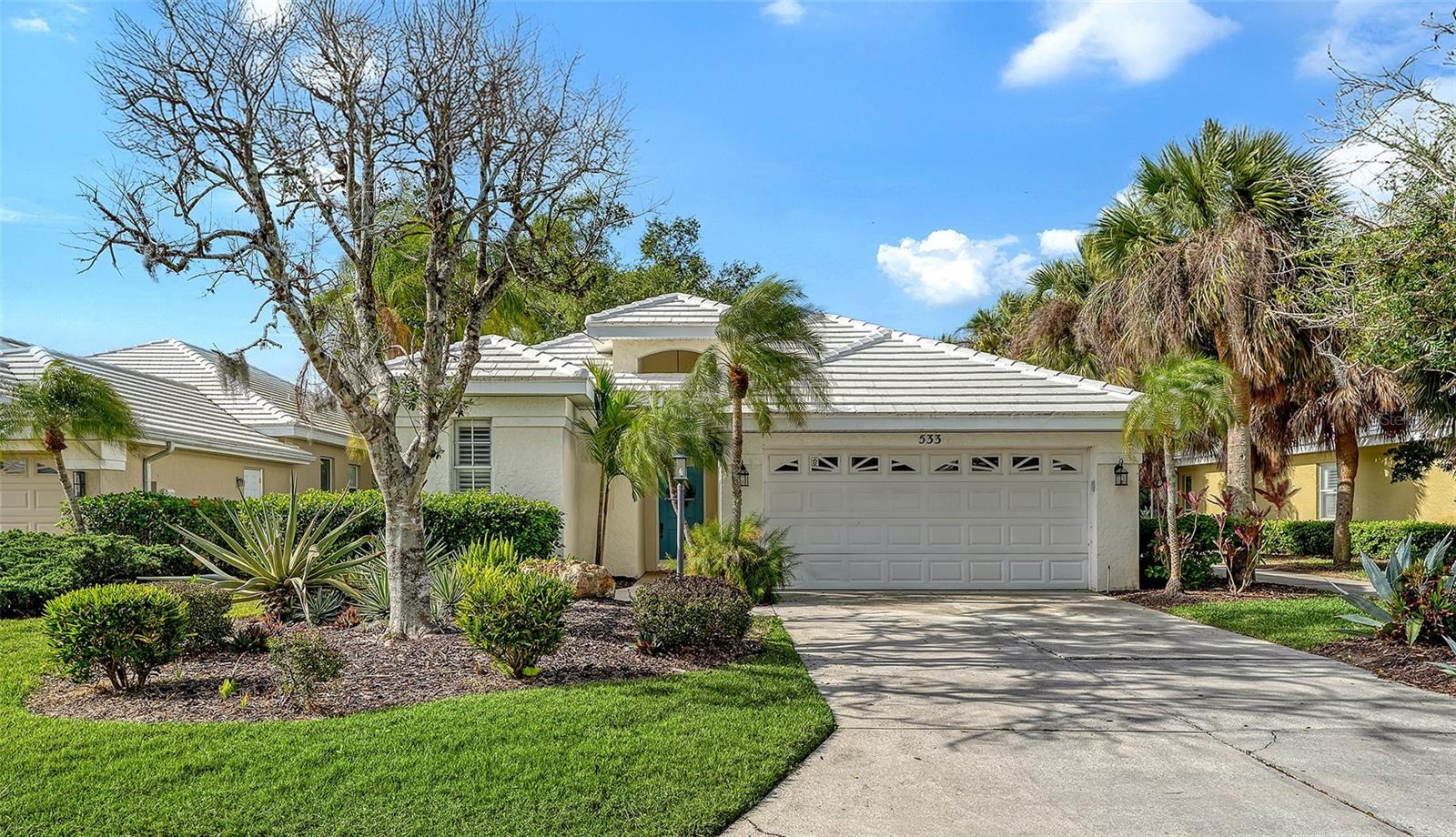 Step into a lifestyle defined by privacy, views, and effortless Florida living in the sought-after Venice Golf and Country Club.

This beautifully maintained, maintenance-free courtyard pool home offers a unique blend of indoor-outdoor living and sweeping golf course views—perfectly positioned to capture the beauty of the recently renovated 18-hole Audubon-certified course.

Enter through your private courtyard oasis, where a sparkling pool and covered lanai create the ultimate setting for relaxing or entertaining. Just beyond, a separate guest suite with a full bath provides exceptional flexibility—ideal as a private in-law suite, guest quarters, or even a secluded home office.

Inside, the home opens to a bright and spacious family room with sliding glass doors framing expansive golf course vistas. The kitchen is thoughtfully appointed with wood cabinetry, stainless steel appliances, granite countertops, and a breakfast bar, while a charming dining nook showcases picturesque views of the fairway and stunning evening skies over hole #6.

The primary suite is a true retreat, featuring a generous layout, a spa-like bath with double vanities, soaking tub, walk-in shower, and a large walk-in closet with natural light and tranquil golf course views. A versatile third bedroom—currently styled as an office—offers direct access to the courtyard, enhancing the home’s seamless flow.

Complete with a two-car garage and additional storage, this residence is designed for both comfort and convenience.

As a resident, you’ll enjoy the full lifestyle experience of Venice Golf & Country Club, including championship golf, Har-Tru tennis courts, a state-of-the-art fitness center, and both casual and fine dining—all within a beautifully established, gated community.

Live where every day feels like a resort—private, picturesque, and perfectly yours.