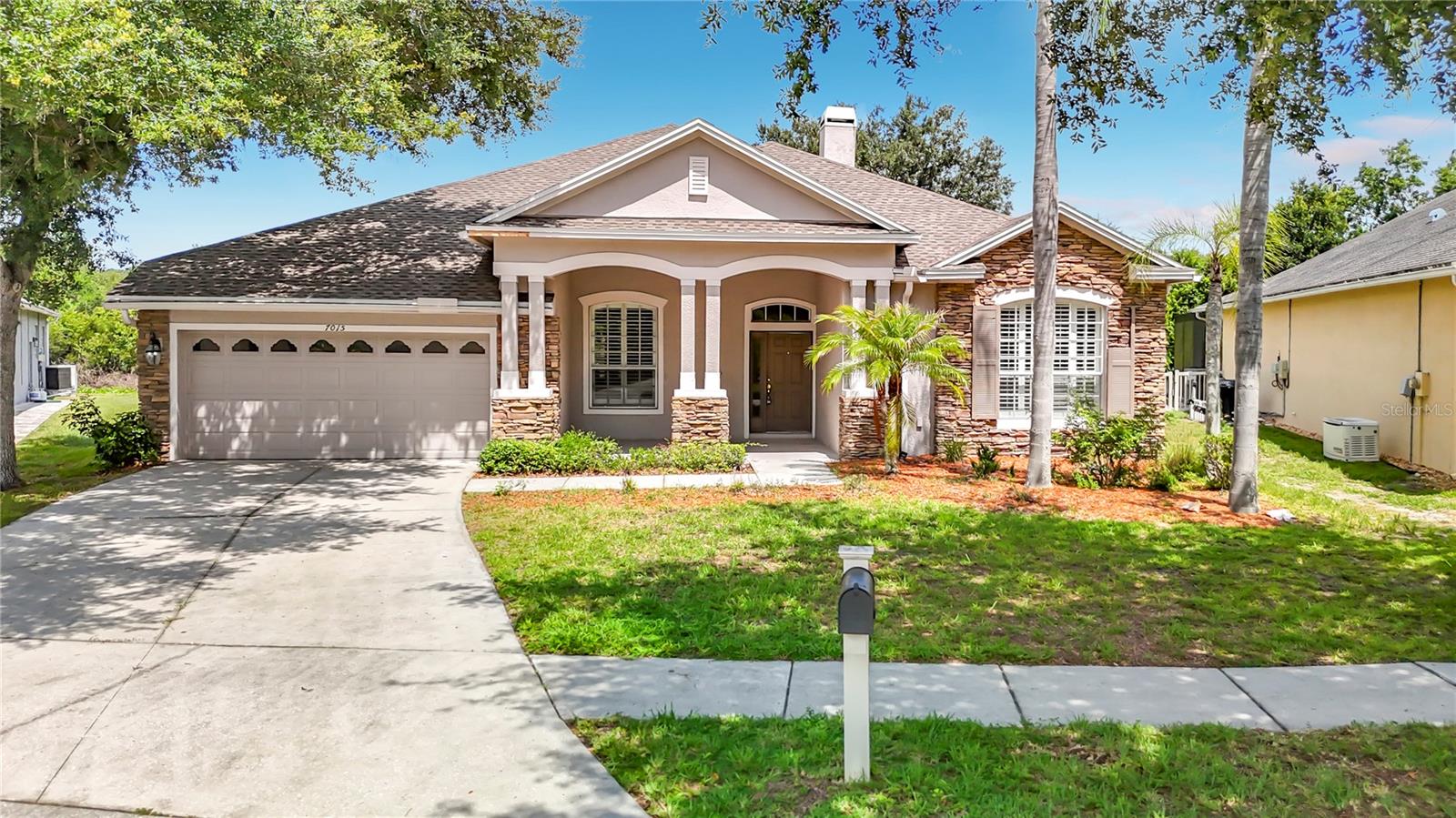 Discover the perfect blend of spacious family living and serene natural beauty at 7015 Cardinalwood Lane in the highly sought-after Wilderness Lake Preserve community of Land O Lakes, FL.
This stunning two-story single-family home, built in 2006, offers approximately 3,384 square feet of thoughtfully designed living space with 4 bedrooms, 3.5 bathrooms, and an attached 3-car tandem garage. Step inside to a welcoming open floor plan where the expansive kitchen seamlessly flows into the family room, ideal for everyday living and entertaining. A separate formal dining room adds elegance for special occasions, while a cozy wood-burning fireplace anchors the family room as a perfect gathering spot. The first floor features a versatile flex space perfect for a home office or additional living area, complemented by a large second-floor bonus room and half bath for even more flexibility.  Peace of mind with brand new 2026 roof, 2018 AC, 2021 AC and 2018 water heater.
The primary suite is a true retreat, boasting generous proportions, breathtaking wooded conservation views, a spacious walk-in closet, dual vanities, a luxurious garden tub, and a separate shower. Additional bedrooms provide ample space for family or guests. Outside, the .35-acre lot offers peaceful pond and conservation vistas on a low-traffic cul-de-sac, creating a private, nature-inspired oasis. A large covered and screened patio provides the ideal setting for outdoor relaxation and has more than enough room to add a pool if desired.
Residents of Wilderness Lake Preserve enjoy an outstanding array of resort-style amenities centered around the impressive Lodge on the 38-acre spring-fed Bay Lake. Highlights include a lagoon-style pool, 25-meter lap pool, hot tub/spa, state-of-the-art fitness center (open early to late), nature center, theater, playgrounds, fishing dock with kayaks/canoes/boats for resident use, tennis courts, basketball courts, volleyball, grills, and a full calendar of community events and classes like water aerobics and yoga. Low HOA and CDD fees support these exceptional facilities, fostering an active, welcoming lifestyle surrounded by nature.
Conveniently located, this home places you within easy reach of everyday essentials and exciting destinations. A Publix and restaurants sit right at the community entrance, with Land O' Lakes High School (an IB program) nearby. Within about 20 miles, explore abundant outdoor adventures at Cypress Creek Preserve (hiking, biking, camping, wildlife viewing), Jay B. Starkey Wilderness Park, Conner Preserve, and the Suncoast Trail. Additional nearby attractions include Plantation Palms Golf Club, Tampa Bay Sporting Clays, and quick access to Tampa Bay area favorites like Busch Gardens (around 13 miles), premium outlets, and beautiful Gulf beaches further west.
This home perfectly combines comfortable, move-in-ready living with the natural serenity and community amenities that make Wilderness Lake Preserve one of Land O Lakes' most desirable neighborhoods. Don't miss the opportunity to make it yours!
