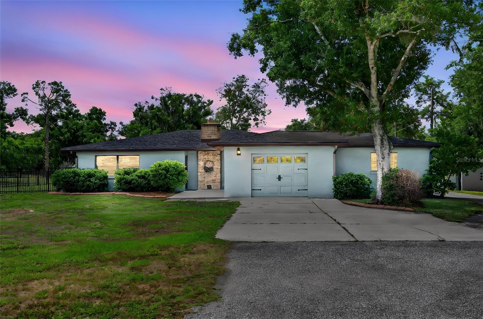 Welcome to 6147 Hupa Road, a beautifully updated 5-acre pool home in the highly sought-after equestrian community of Myakka Valley Ranches, just 30 minutes to Siesta Key Beach. Set on a private dead-end street with no through traffic, this 3-bedroom, 2-bath block construction home offers 2,346 sq.ft. of living space, including a versatile bonus room that could be used as a 4th bedroom, gym, game room, office, or guest space, plus an attached single-car garage. Inside, you’ll find gorgeous vinyl flooring, spacious bedrooms, an updated kitchen with wood cabinetry, quartz countertops, stainless steel appliances, new fixtures, and a large walk-in pantry that could also function as a small office, desk area, or dog kennel. The home also features a separate large laundry room/mud room and an updated primary bathroom with modern fixtures and a glass shower door. Major updates include a new roof and A/C in 2023, new ductwork and blown-in insulation in 2020, whole-house reverse osmosis water system, fiberoptic internet, EV charger, 2025 pool pump, and replaced pool cage screens. Enjoy outdoor living with a private pool and screened porch overlooking the pastures and pond. The property includes three cross-fenced pastures, four horse stalls with water and electric, a 2026 barn roof, covered boat or RV parking, covered carport parking for 3 cars, a stocked pond, and two large detached metal buildings totaling approximately 3,688 sq.ft., ideal for workshops, hobbies, storage, equipment, or room for up to 6 to 8 cars. Located in Unit 1 of Myakka Valley Ranches with a voluntary HOA, the community offers miles of riding trails and is next door to Myakka River State Park, Florida’s largest state park. Near A+ rated schools, shopping, and dining, this property offers the perfect blend of privacy, acreage, equestrian amenities, and Sarasota convenience.