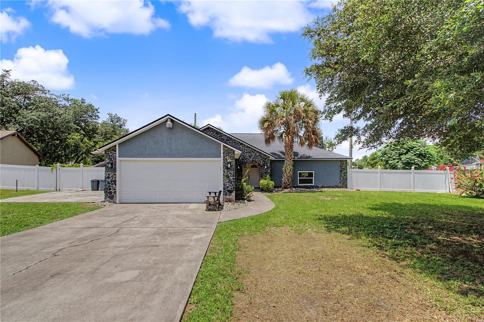 Lovely and unique 3 bedroom 2 bath home with a 15' x 30' inground Pool and a 2 car garage on .31 acre in a very desirable location in Marion Oaks. NO HOA! Split floor plan. Fenced yard. Outside covered porch. The pool was resurfaced in 2021. The Roof and the 200 AMP electrical panel were replaced in 2021 and the HVAC was replaced in 2023. The insulation in the attic was replaced in 2026 and the home has a tankless water heater. The flooring throughout is all neutral tile. There is a living room with a wood burning fireplace, a generously sized dining area, and a large den/flex area with stairs that lead to a Loft which could be used for an office, exercise room, play area, etc. Both bathrooms have skylights and the flex area has 2 skylights. The primary bedroom is very spacious and the primary bath has double vanity sinks. The windows, doors and kitchen cabinets were updated just before the seller purchased the home. The seller renovated the guest bath after they purchased the home. Very convenient proximity to I-75 and an easy commute to Gainesville, Tampa and Orlando. The home is approximately 2 miles to the new Walmart being built on Hwy 484 and 2.5 miles to the new Publix being built on Hwy 484. It is also within 10 minutes of West Marion Hospital, lots of retail shopping and restaurants, a movie theater, medical facilities, schools, parks, etc. Public golf courses are nearby. Approximately 30 minutes to the World Equestrian Center, Rainbow Springs State Park and The Villages, and about 40 minutes to Silver Springs State Park.